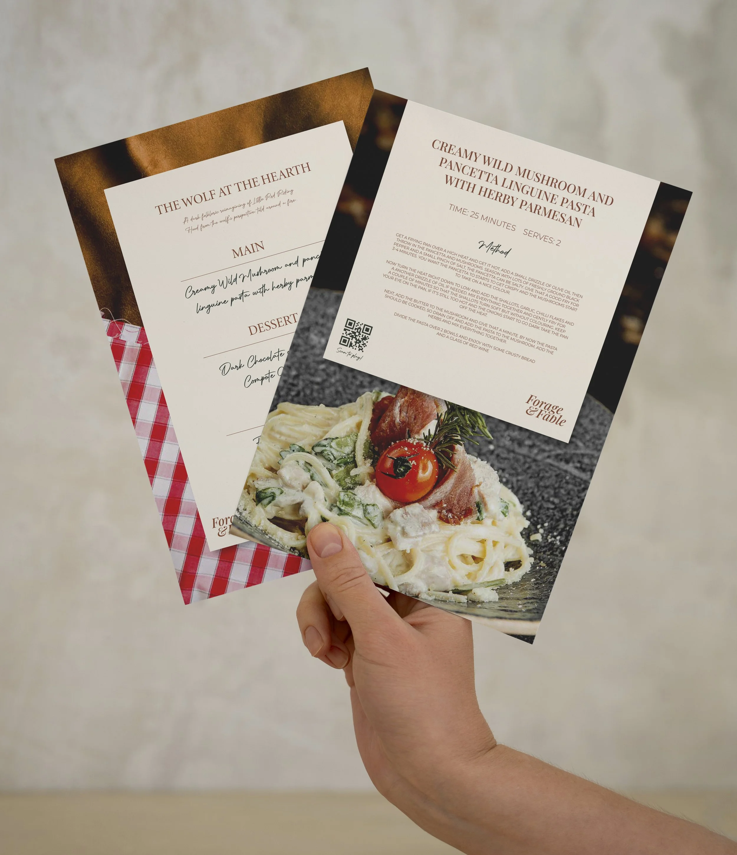 Person holding three restaurant menus, with a plate of pasta featuring cherry tomatoes and prosciutto in the foreground.