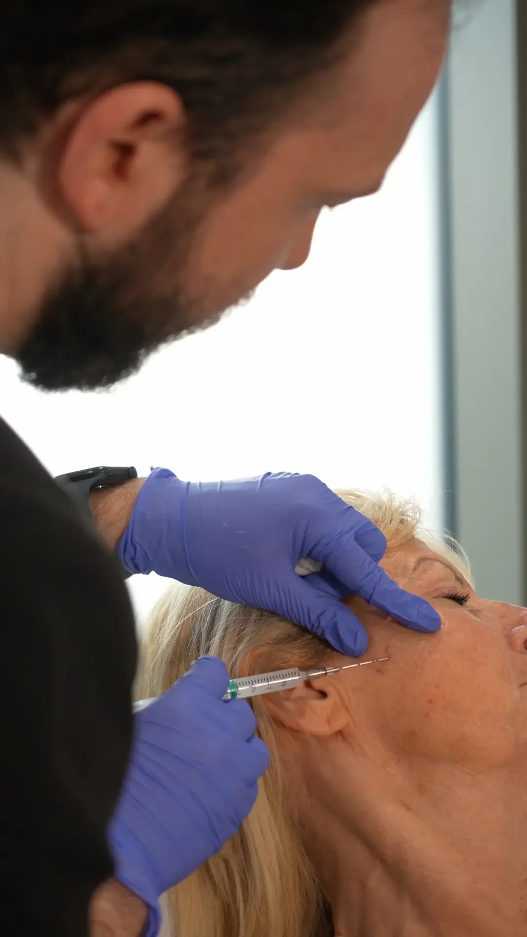 Dr Karim Ghabra injection profhilo skin booster into patients skin to improve collagen and skin laxity
