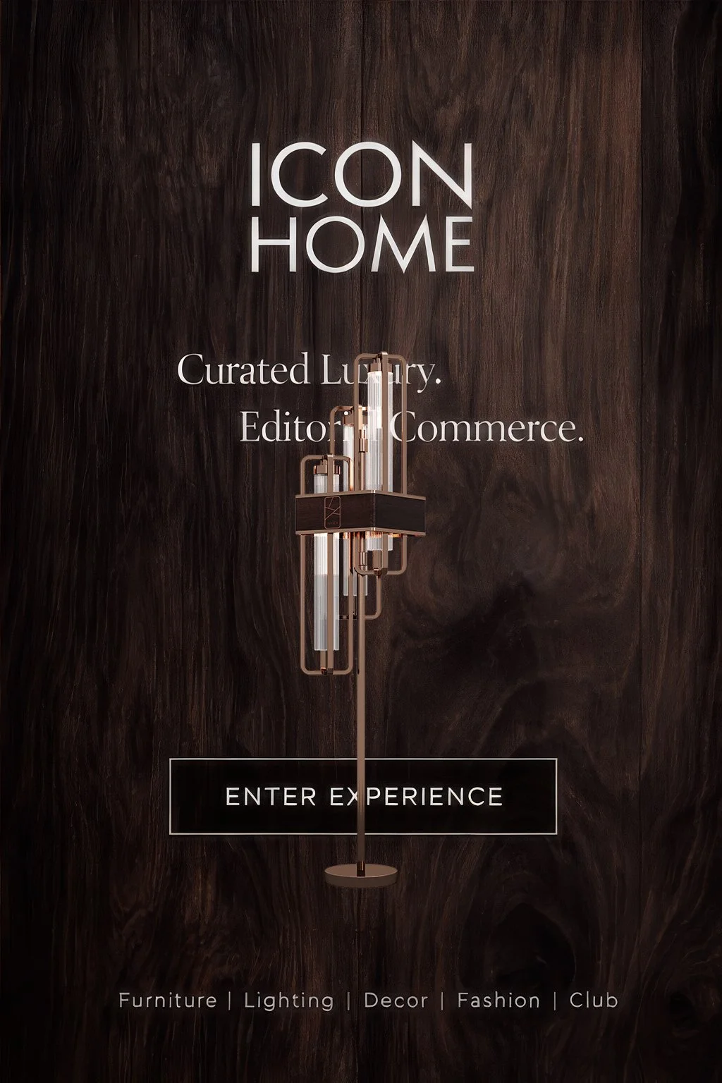 A dark wood textured background with the text 'ICON HOME' and 'Curated Luxury. Editor of Commerce.' in white, accompanied by a modern chandelier and a button that says 'ENTER EXPERIENCE'. Subtext mentions furniture, lighting, decor, fashion, and club