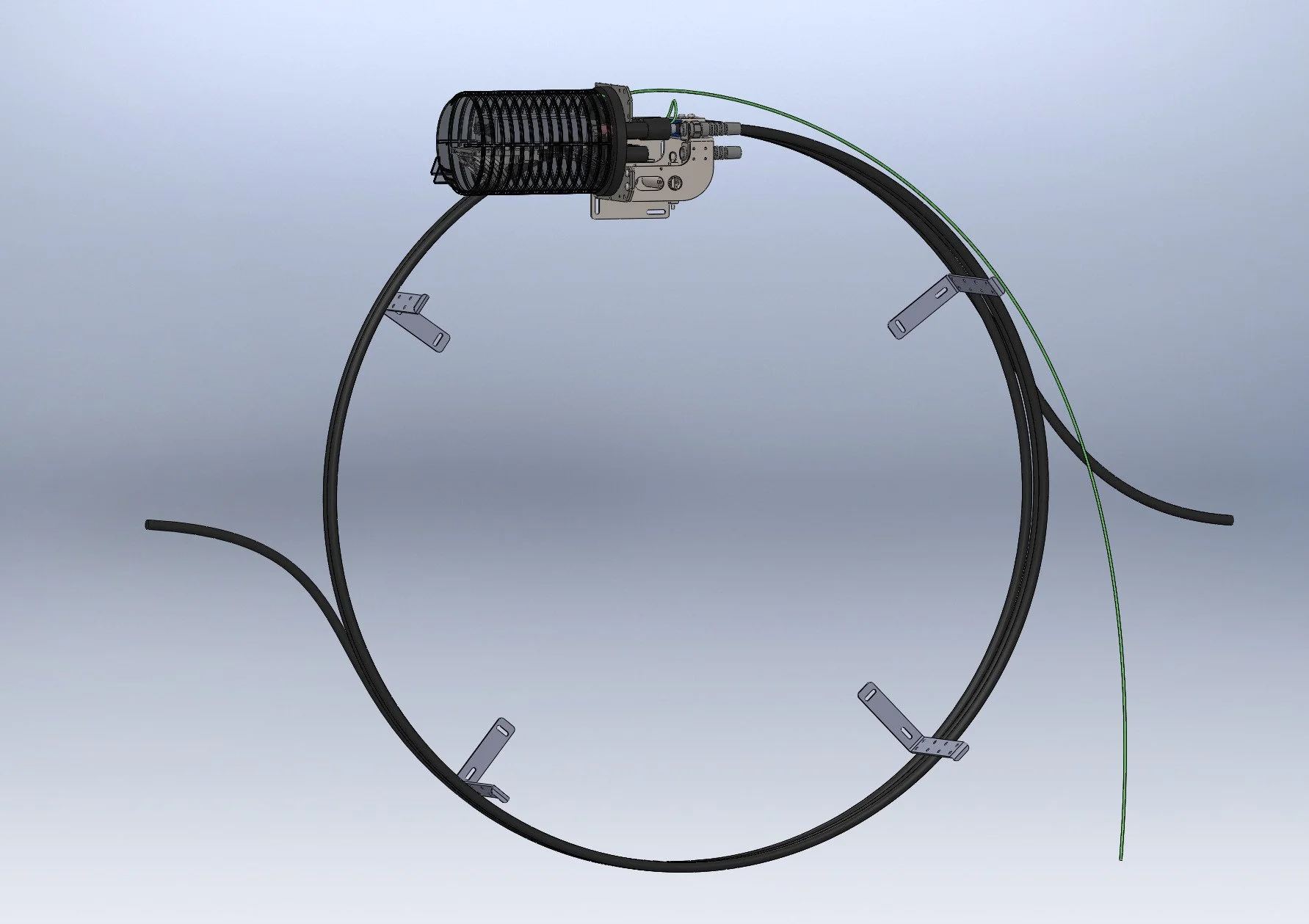 A mechanical or electronic device featuring a large circular structure with components attached inside, including a black cylindrical component at the top and several metallic brackets and wires.