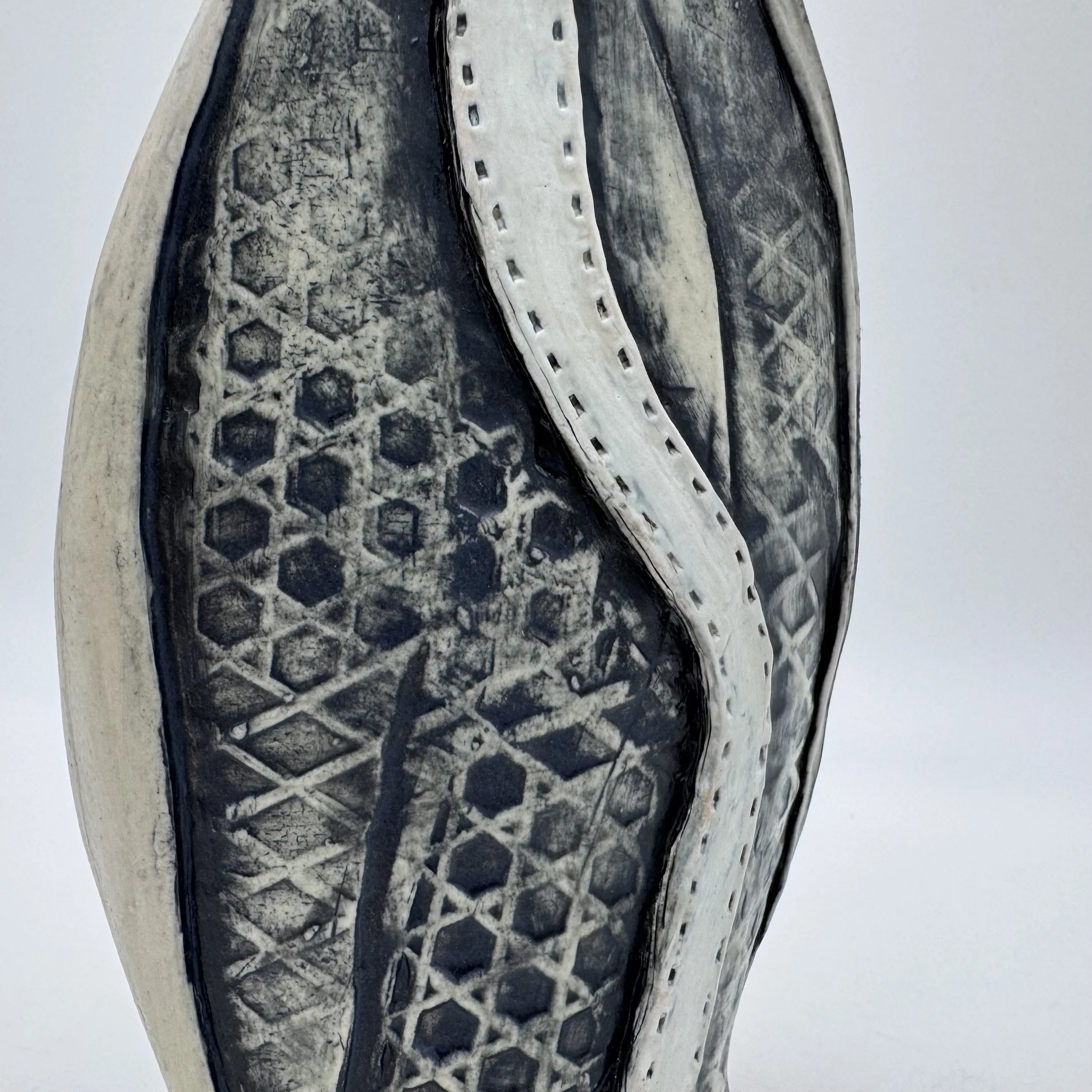  Fried , 2026, Ceramic, glaze & luster, 4"x2.5"x9"