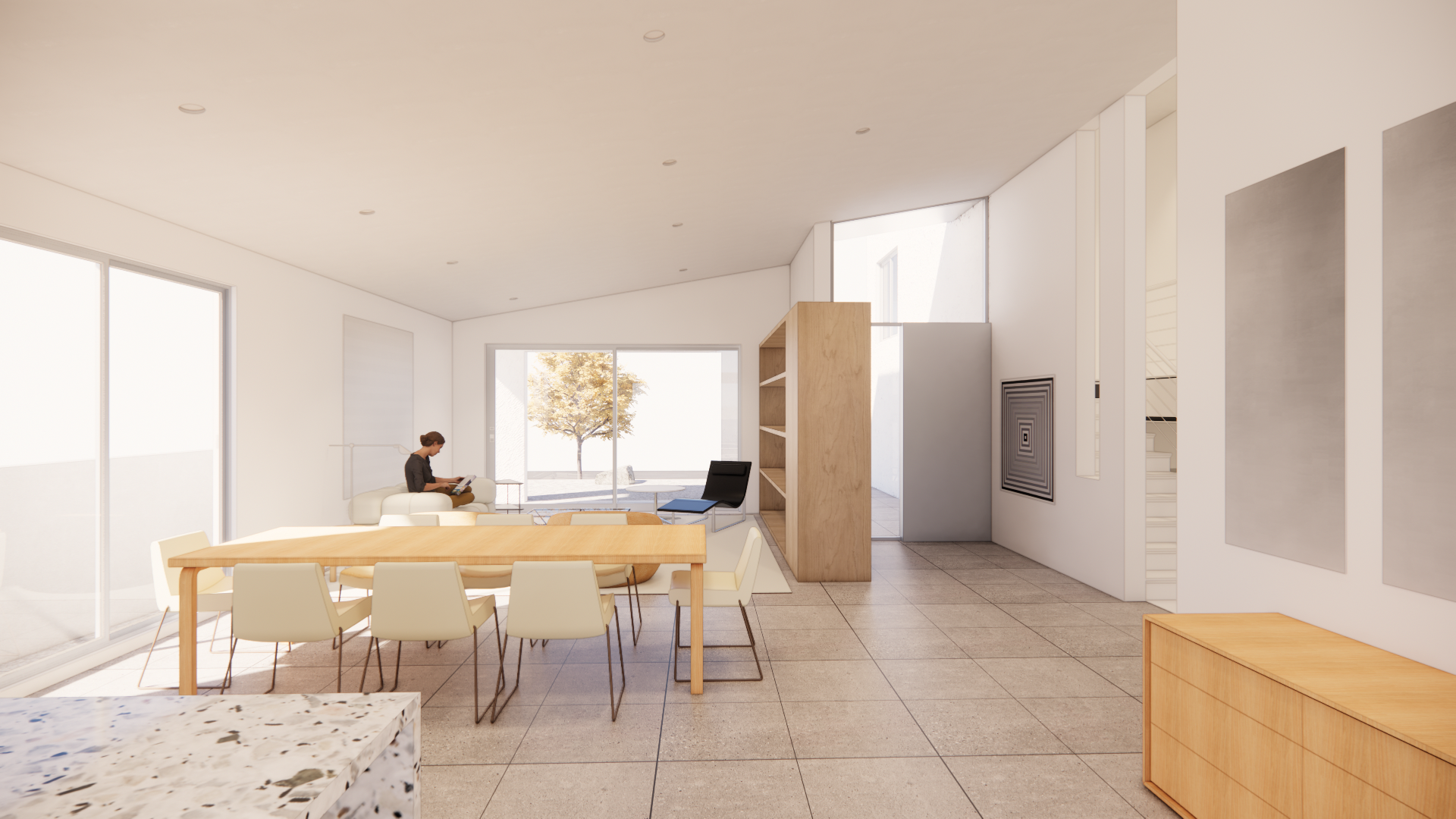 Modern, open-concept living and dining area with minimalist design, large windows, beige tiled floors, a wooden dining table with cream chairs, a woman sitting on a white sofa reading, and a sliding glass door leading outside where a tree is visible.