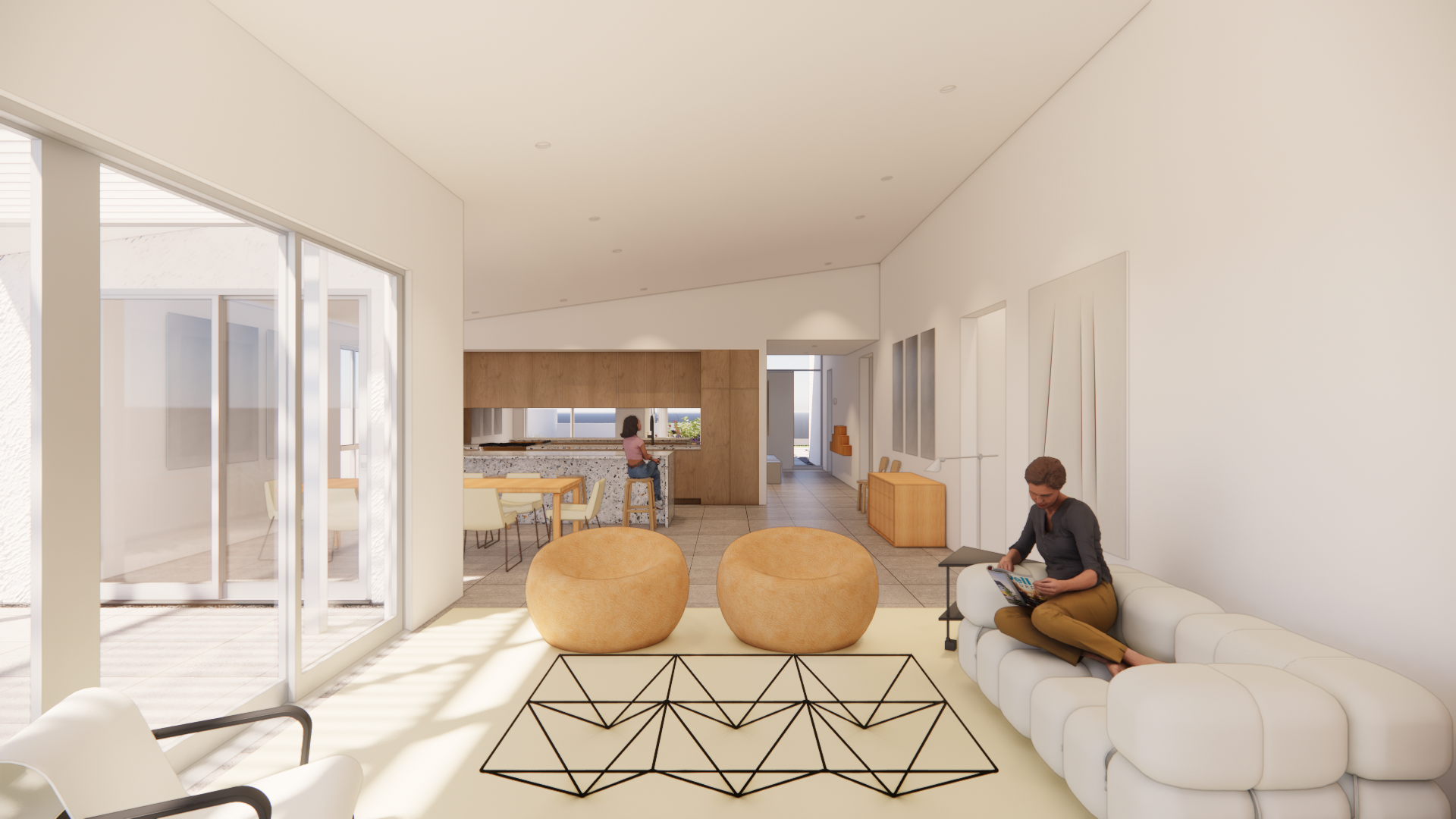 Modern living room with white sectional sofa, two beige poufs, a geometric rug, and a woman reading on the sofa. Open kitchen and dining area with wooden accents in the background.