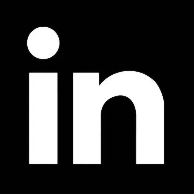 Close-up of the black and white logo with the letters 'in' on a black background