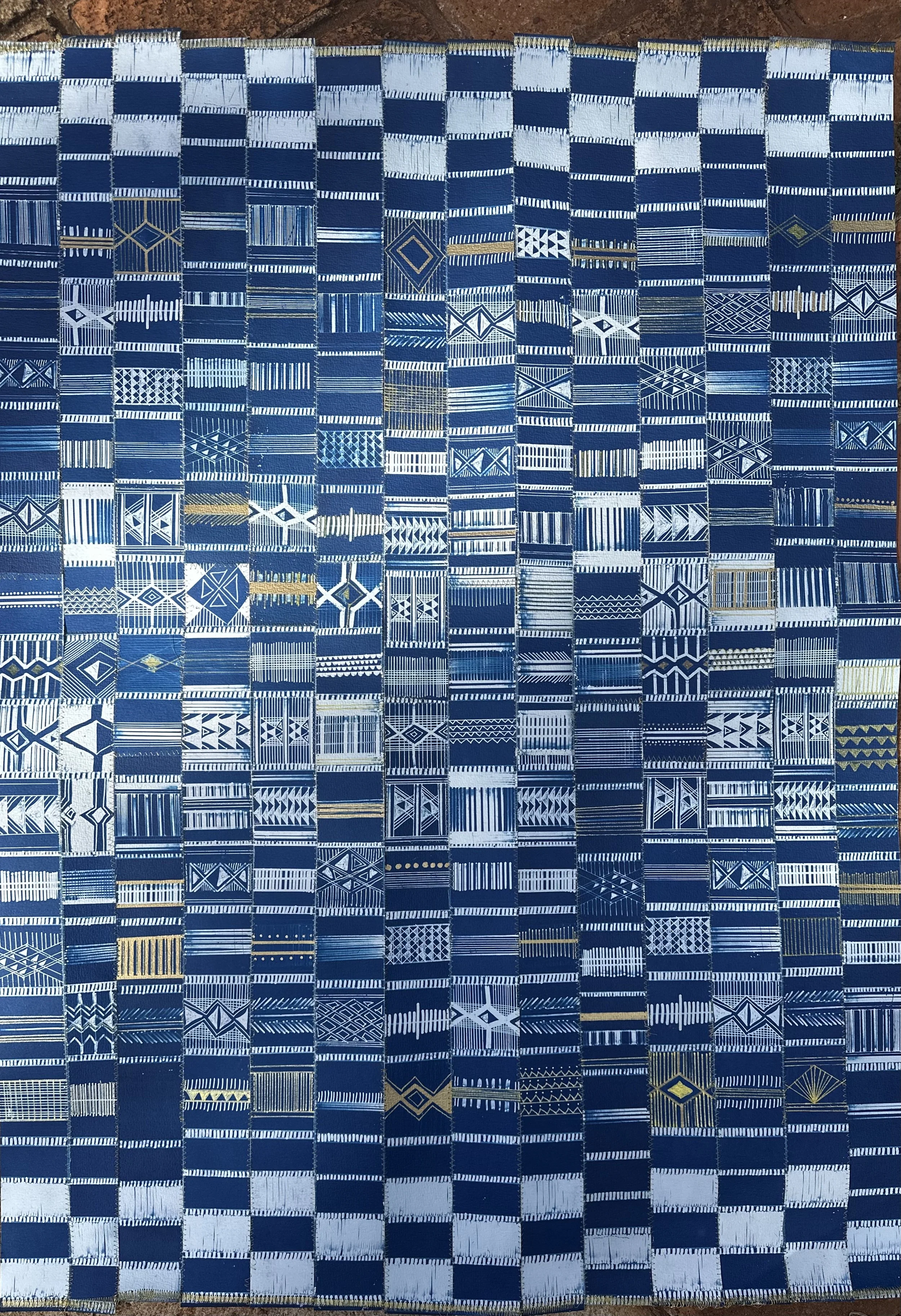 Elizabeth Ashamu Deng, Djerma Blanket, 2025. Quilted collage of cyanotype print on watercolor paper, 71 cm × 100 cm.
