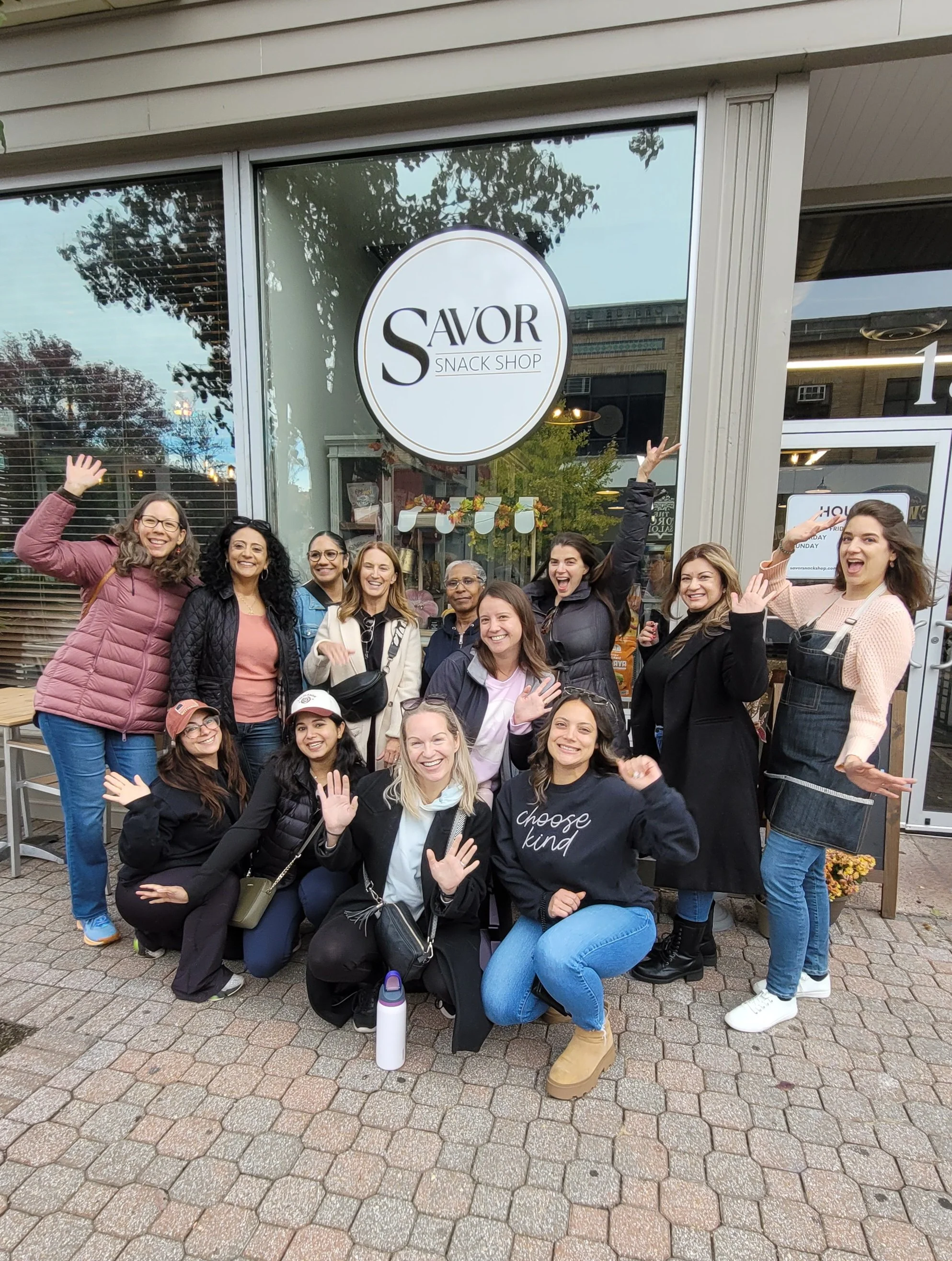 Group of women business owners outside Savor Snack Shop in Cranford, NJ