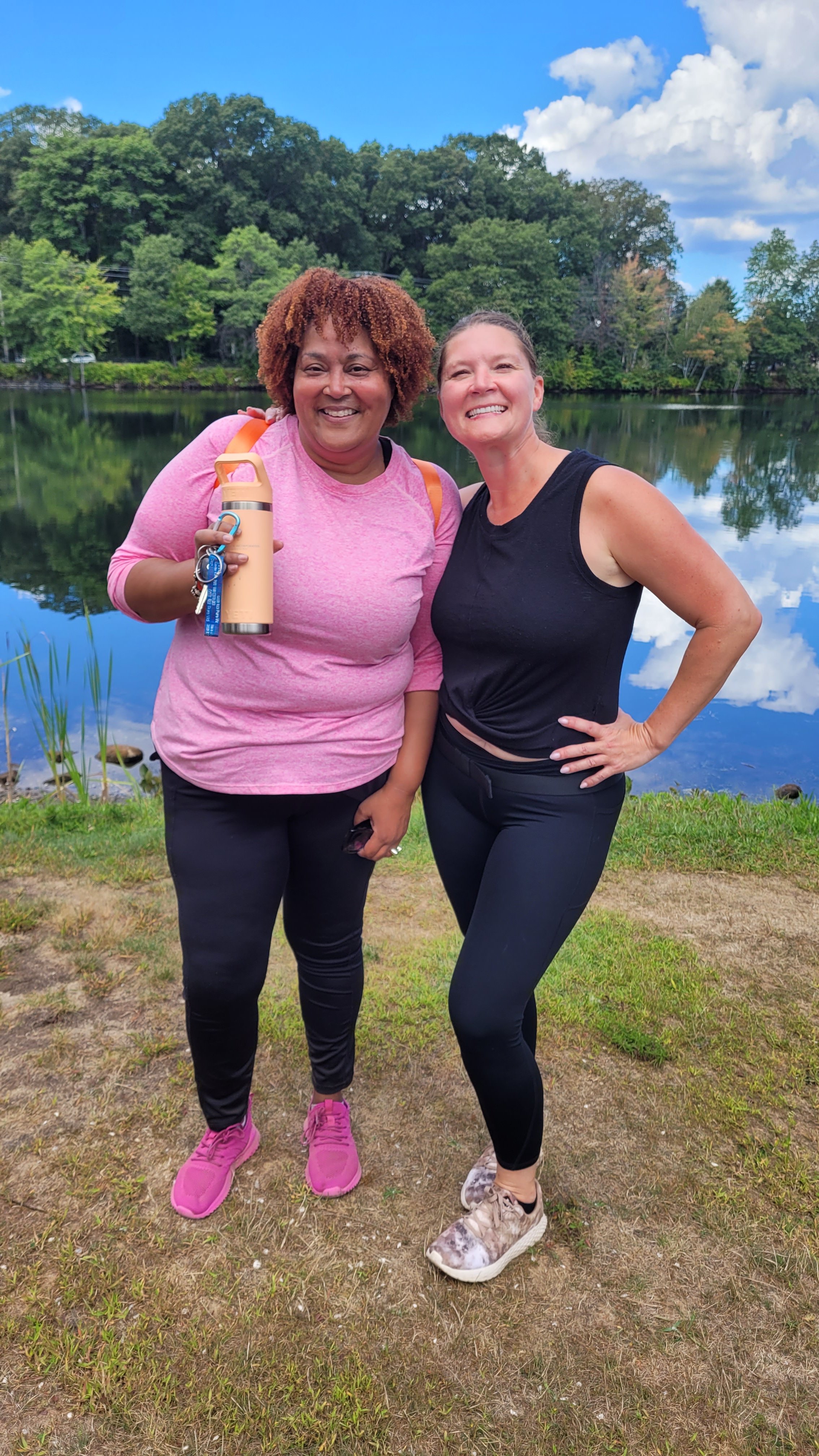 Two women entrepreneurs smiling and posing for a photo after a BizBestie Walk networking walk in Roxbury, NJ