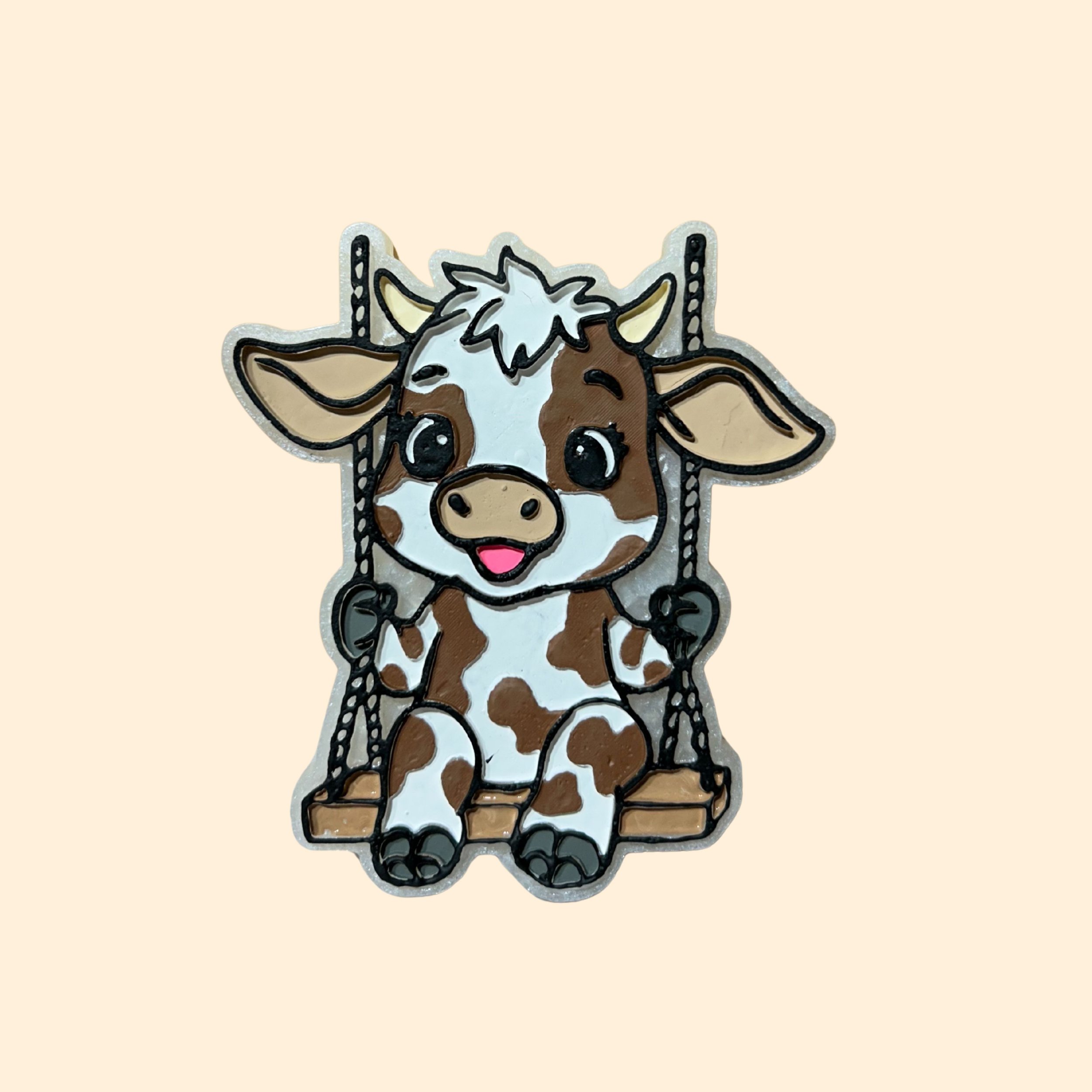 Cow on a swing
