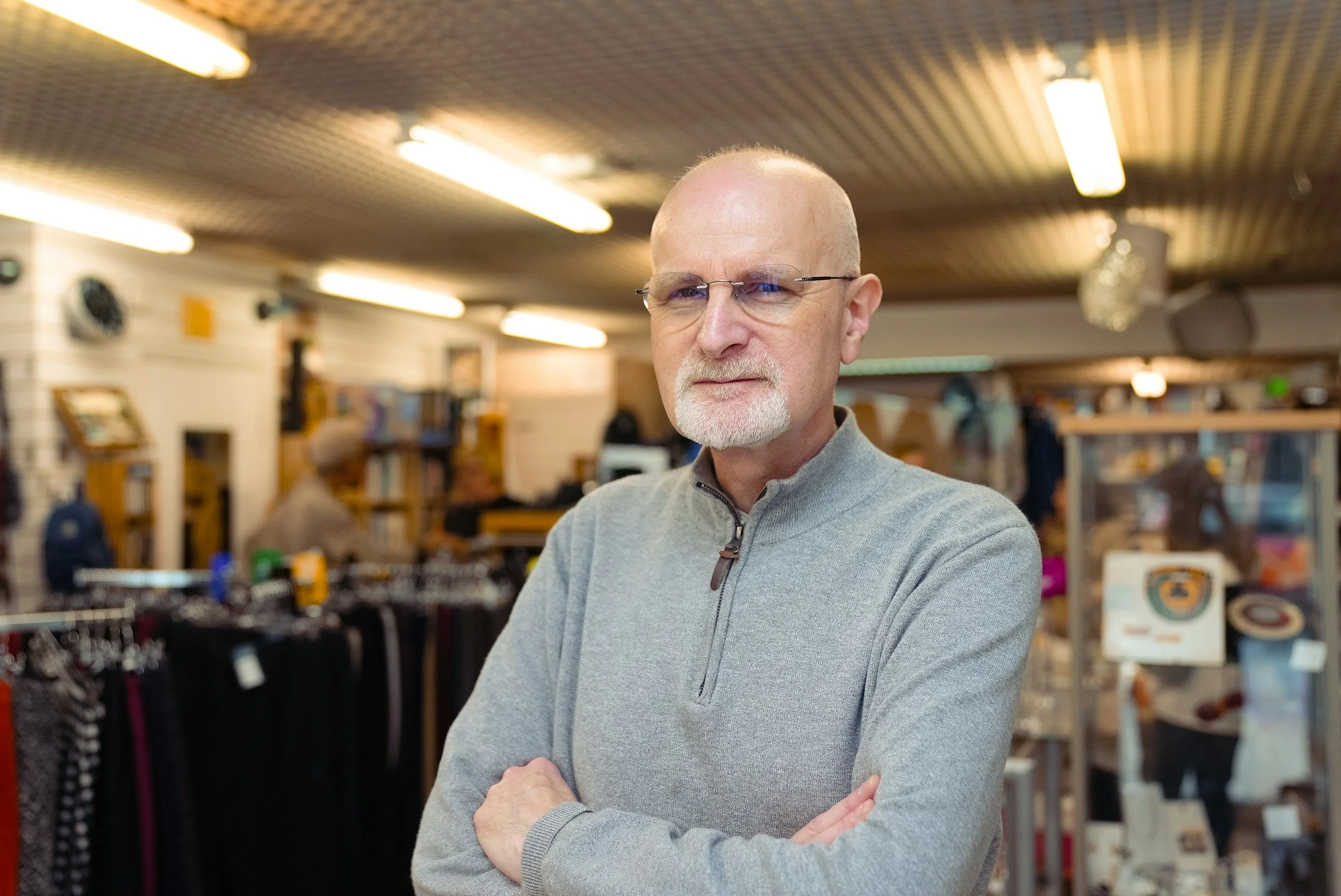 Small business owner in his shop, planning the future of the business he built