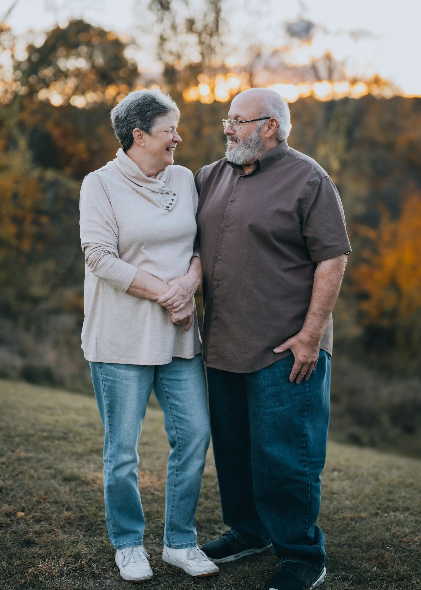 Senior couple standing together outdoors, protecting retirement savings with asset preservation planning in Virginia Beach
