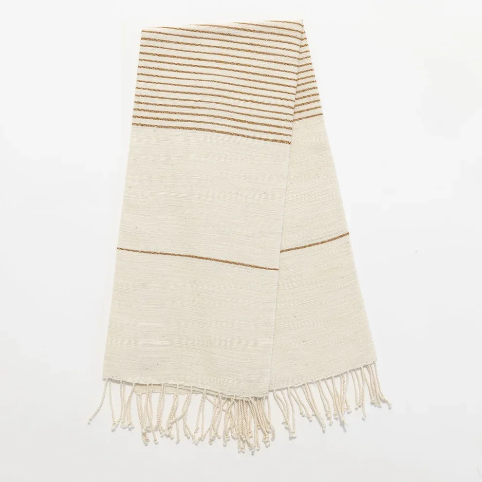 Roha-kitchen-towel-bronze-flat-lay.webp