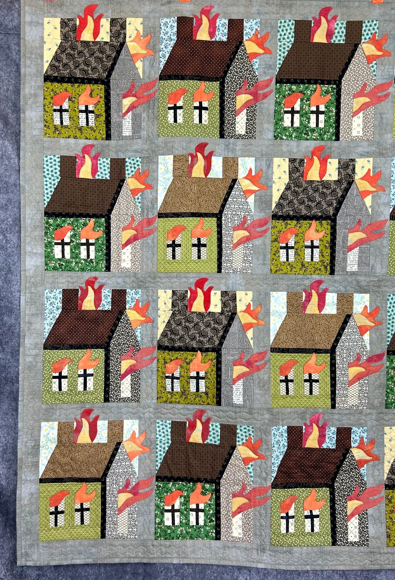 handmade applique quilt wall art with folk art storytelling theme