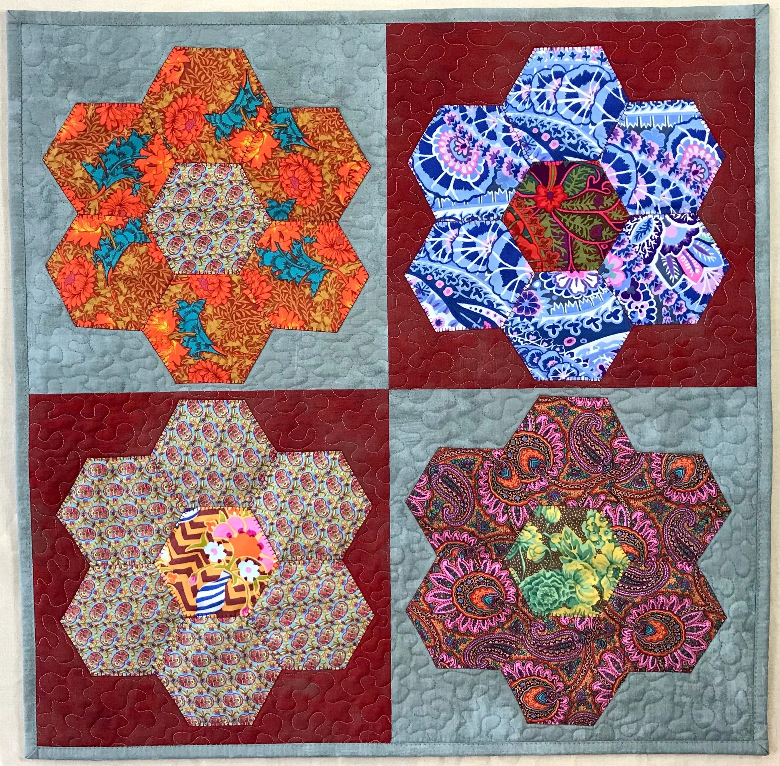 quilted Euro pillow sham in a hexagon flower pattern