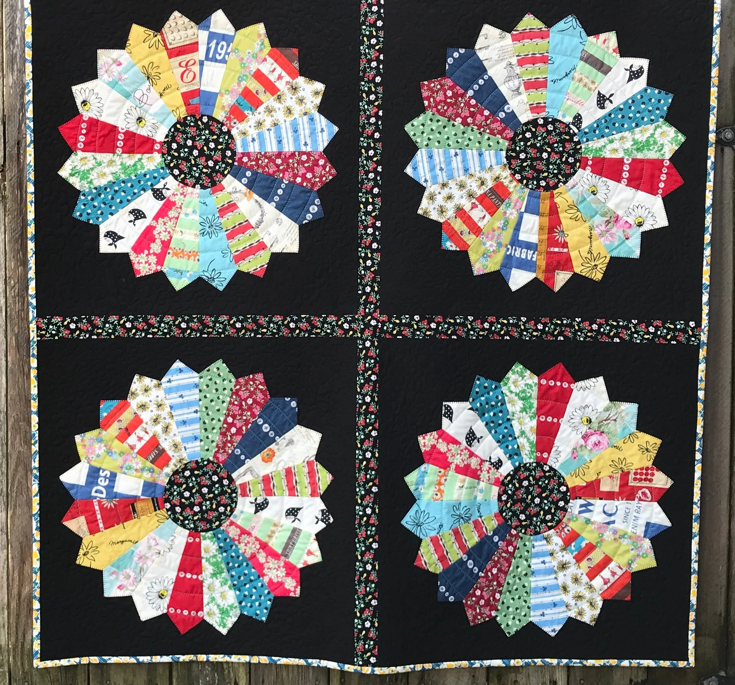 vintage Dresden plate baby quilt made with Japanese feedsack