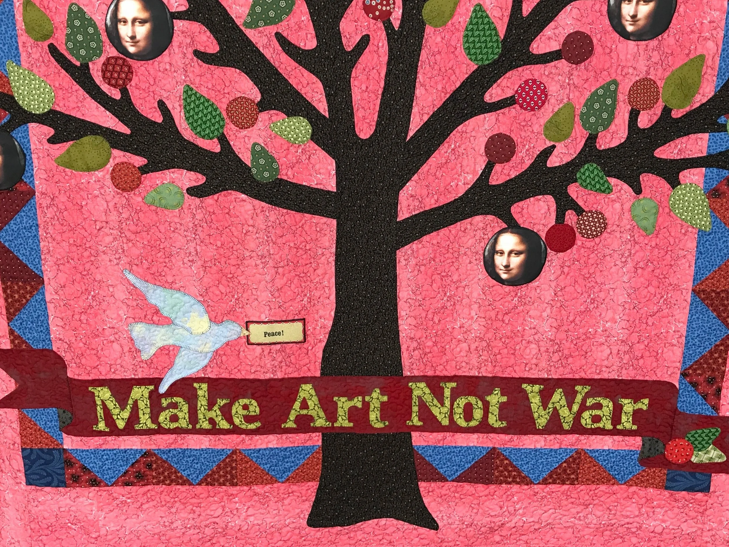 Peace banner that reads Make Art Not War with a peace dove flying across