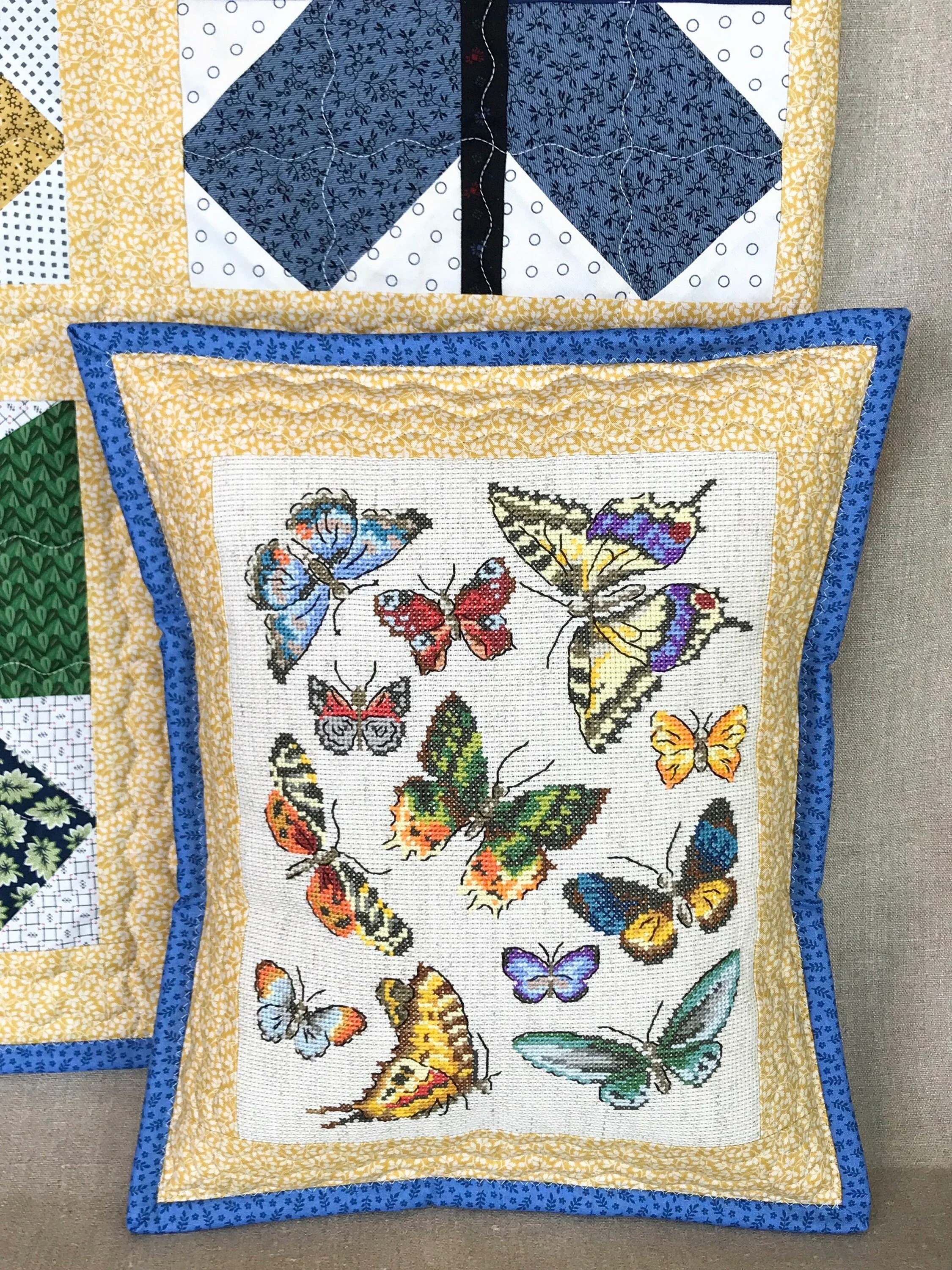 butterfly cross stitch pillow detail of ooak pillow