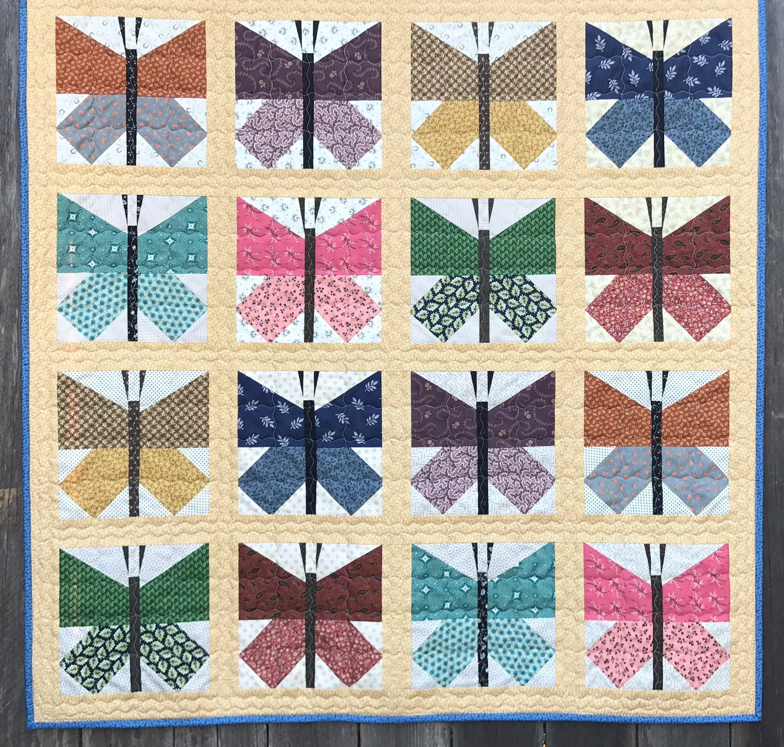 butterfly baby quilt made with reproduction Feedsack fabrics