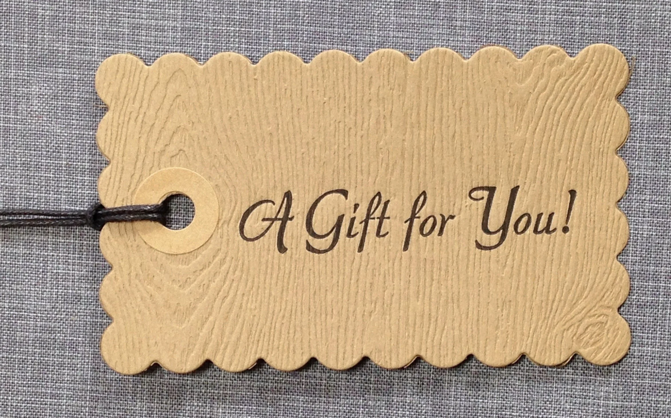 vintage gift tags on wood grain letterpress paper