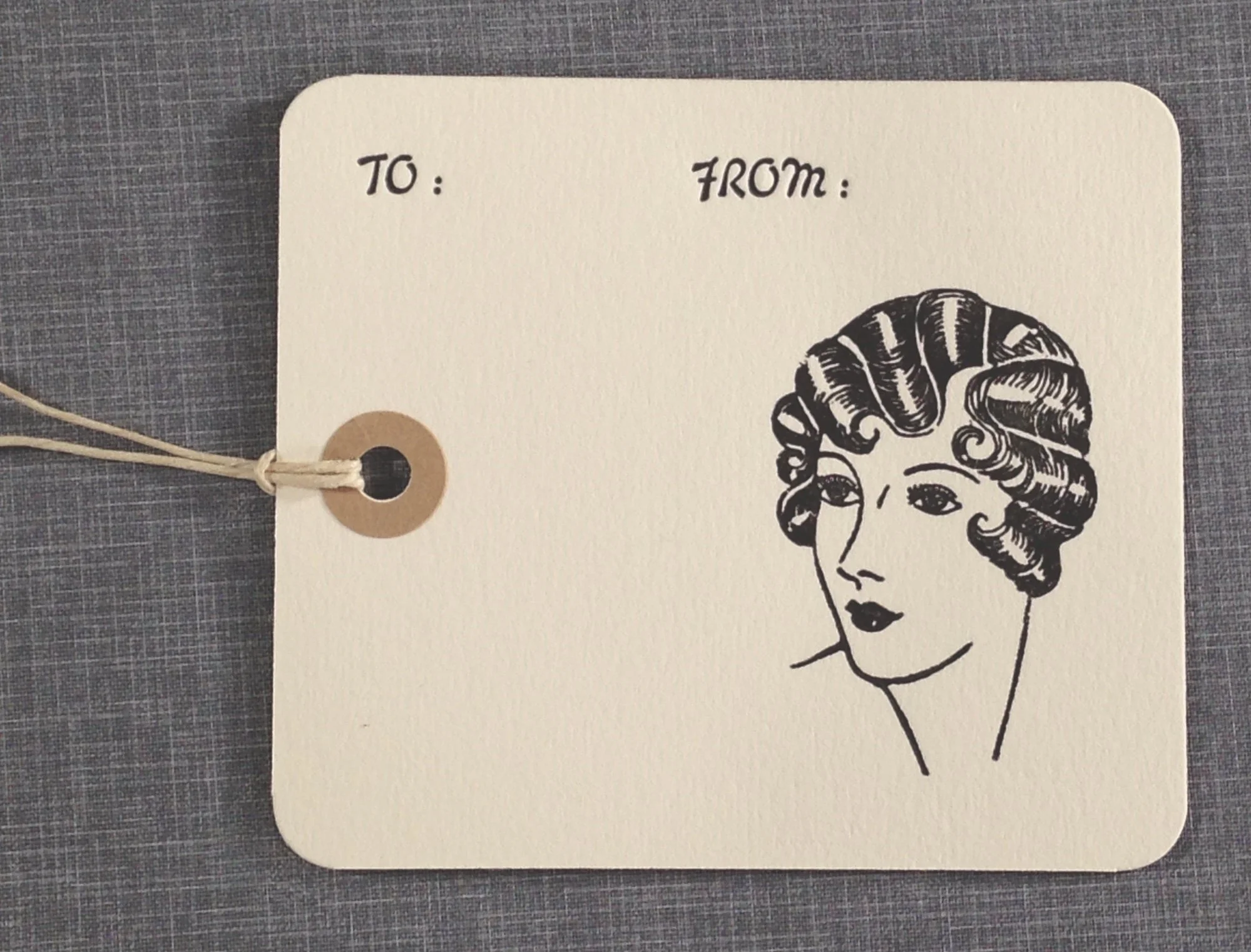 letterpress hang tags - flapper with waves