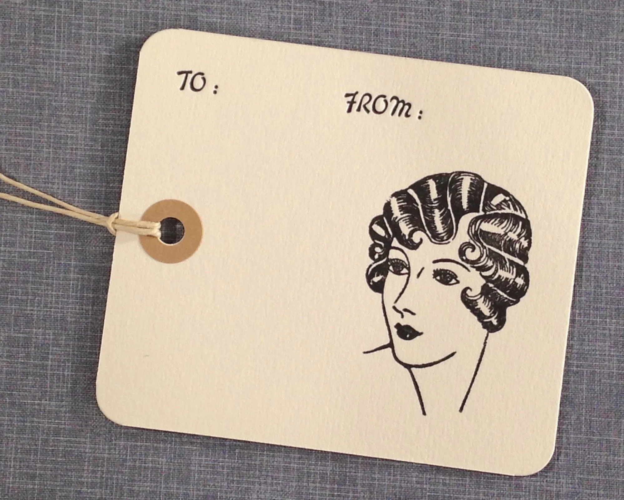 gift tag with an image of a flapper with wavy hair