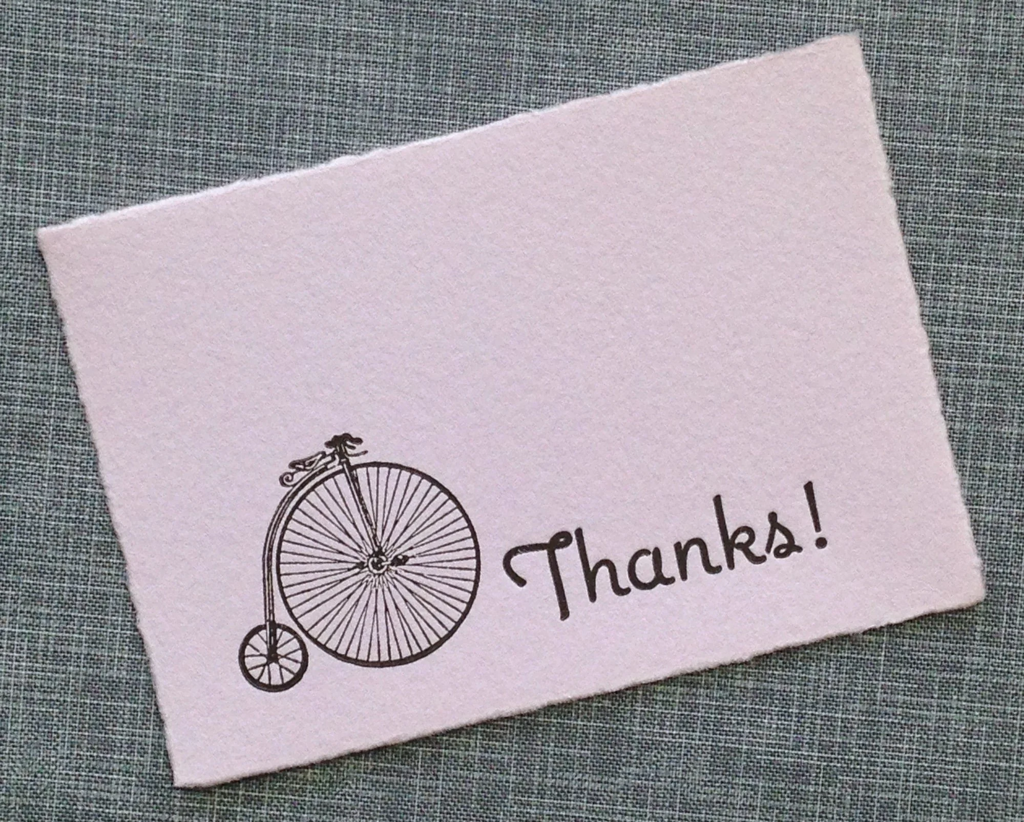 vintage greeting card on lavender paper with vintage bicycle