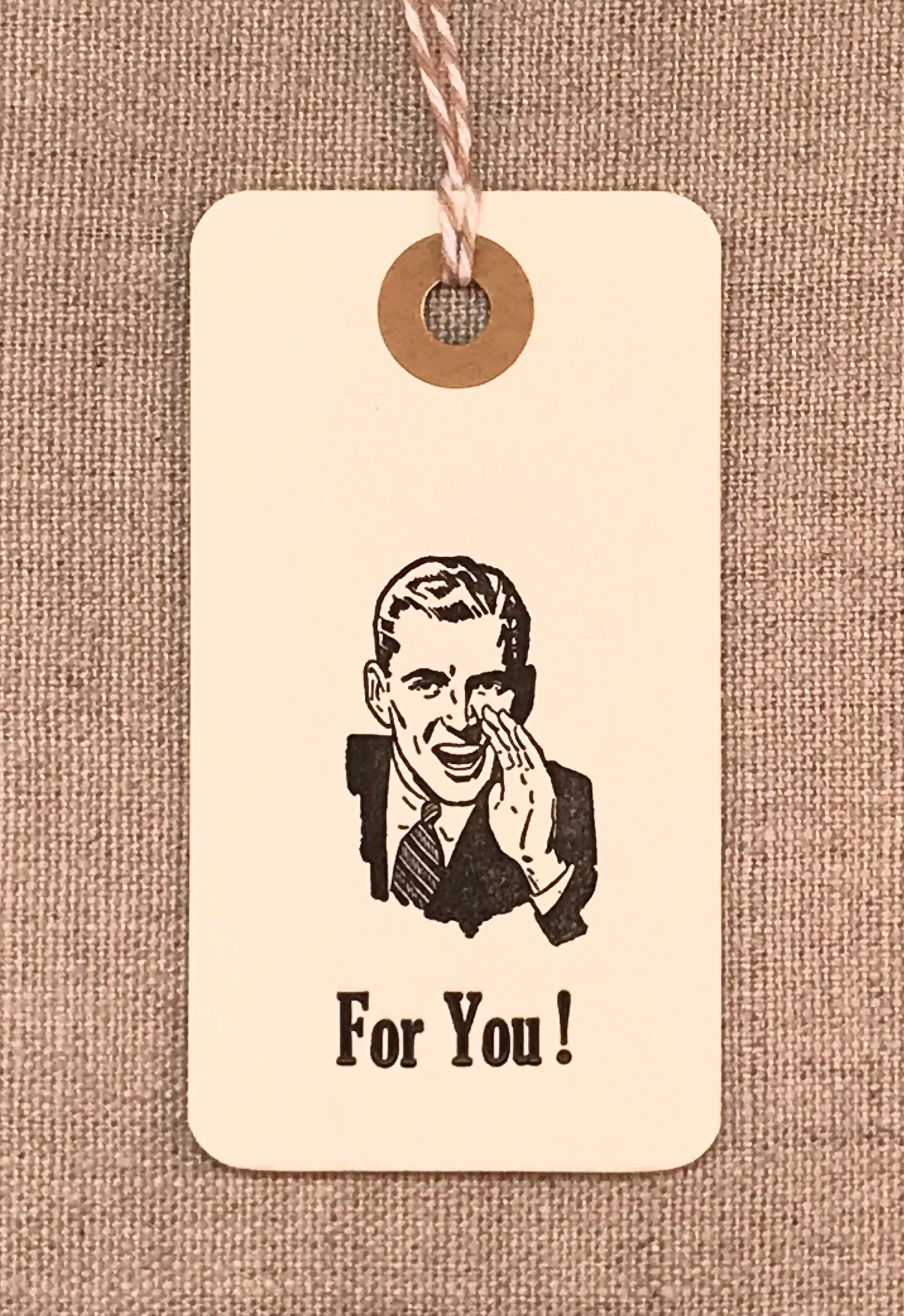 hang tags with a vintage advertising image