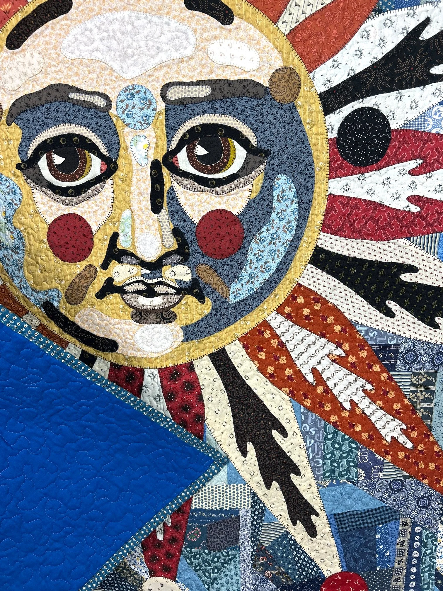 pictorial applique face quilt