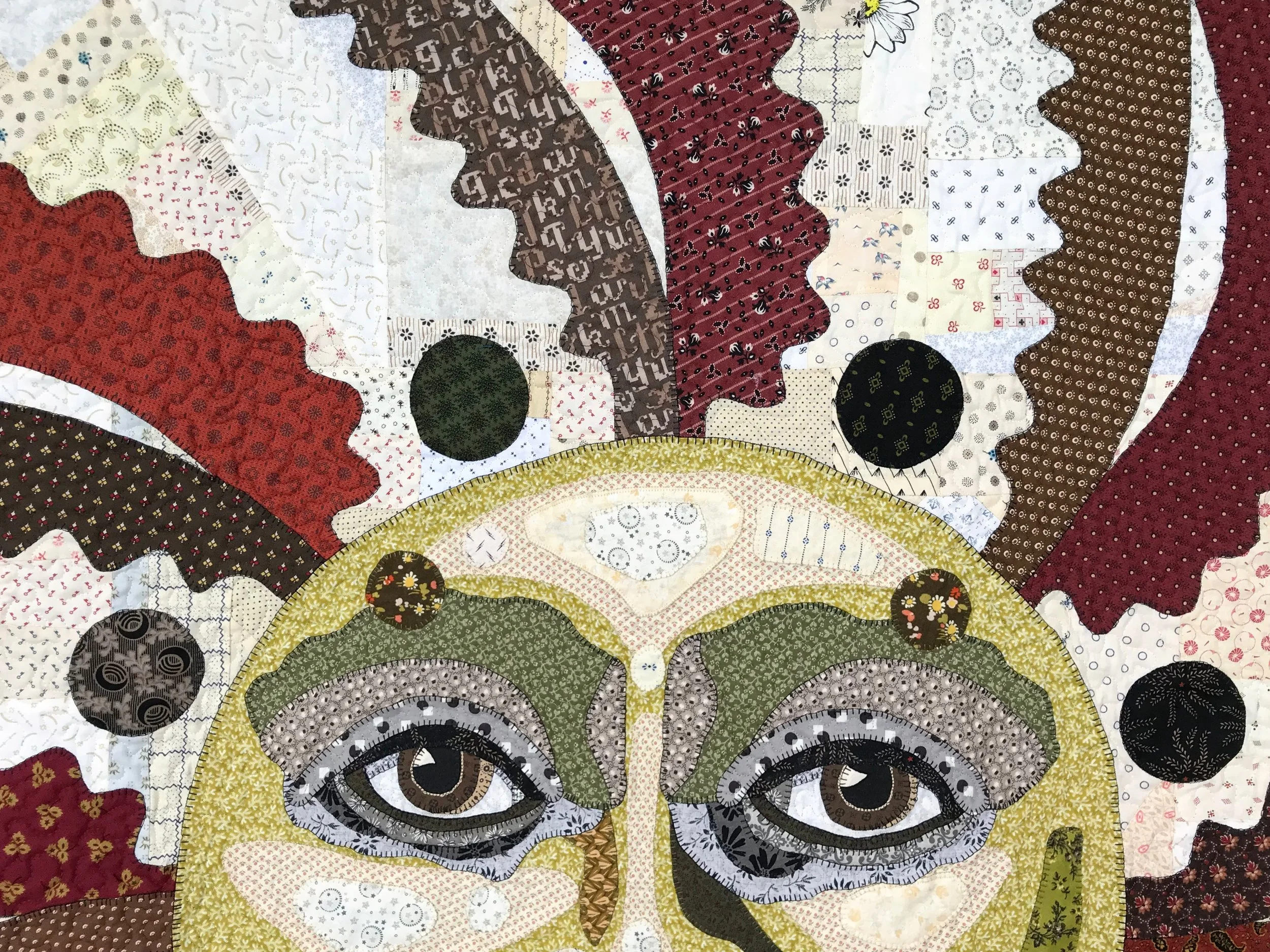 heirloom folk art crazy quilt with man in the sun