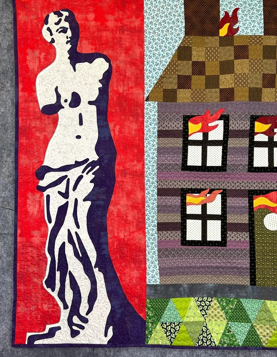 folk art quilt with jewel toned 19th century fabrics and distressed muslin flames