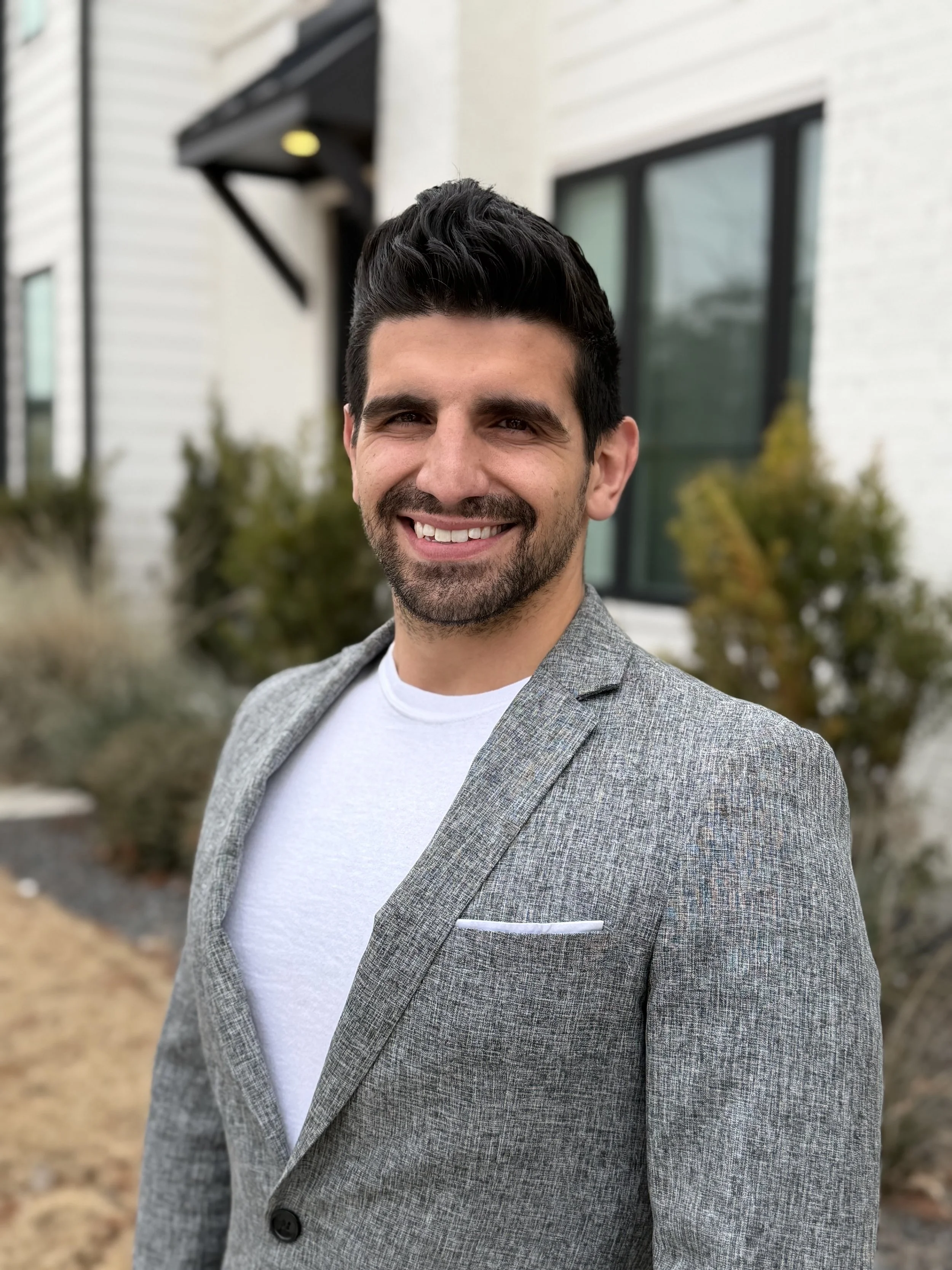 A headshot of Vestora's co-founder and partner Lawrence Courtien.