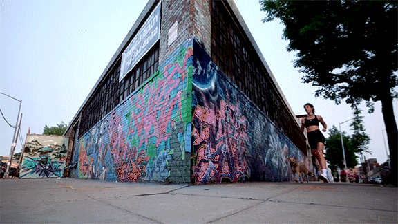 A woman wearing Adidas shoes