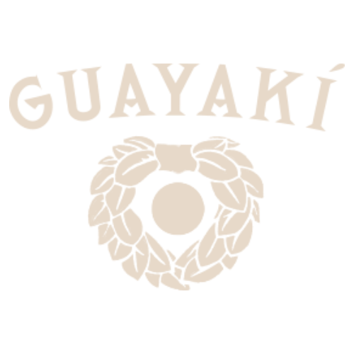 A logo with the word 'GUAYAKI' above a circular illustration of a wreath around a central circle, all on a black background.