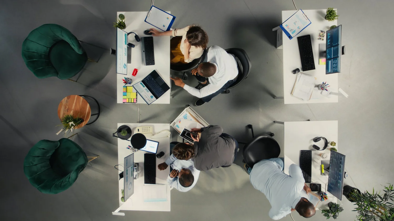 A team reviewing contact center performance charts during a quarterly business review