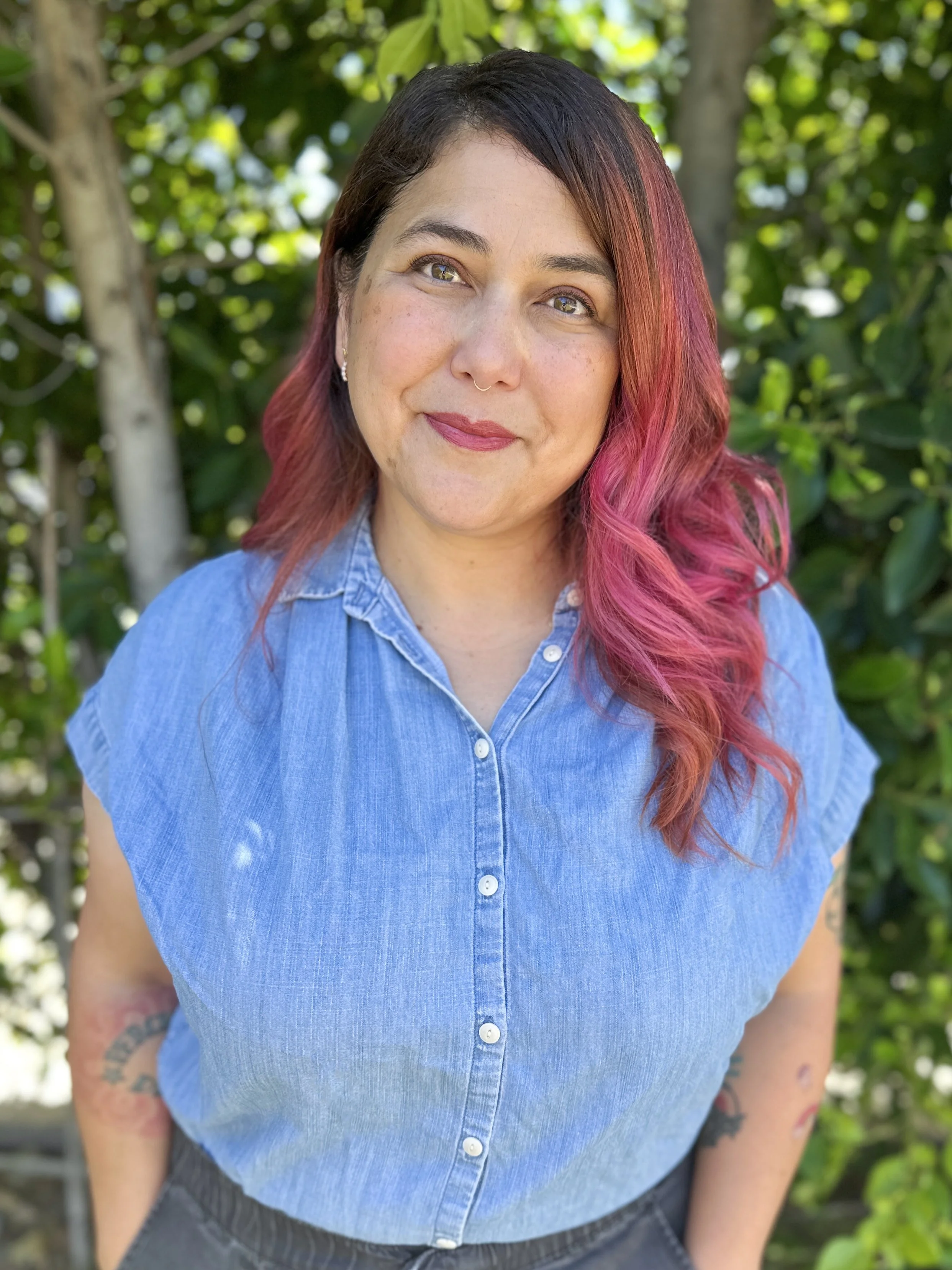 an image of Leilani Francisco-DeLay smiling at the camera