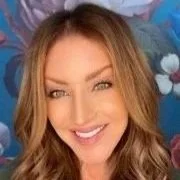 an image of Lauren Leblanc smiling at the camera