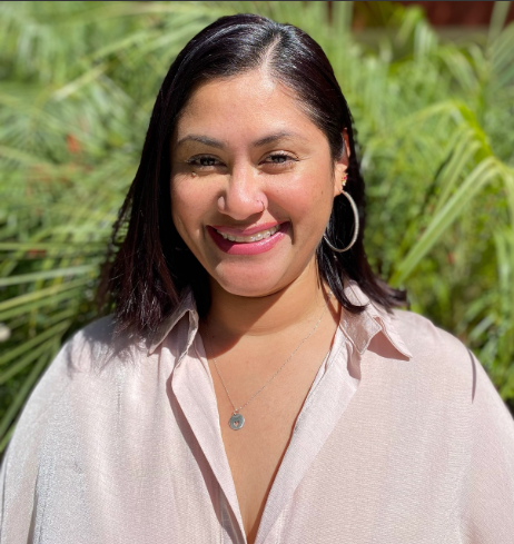 an image of Ivonne Saracay Smith smiling at the camera