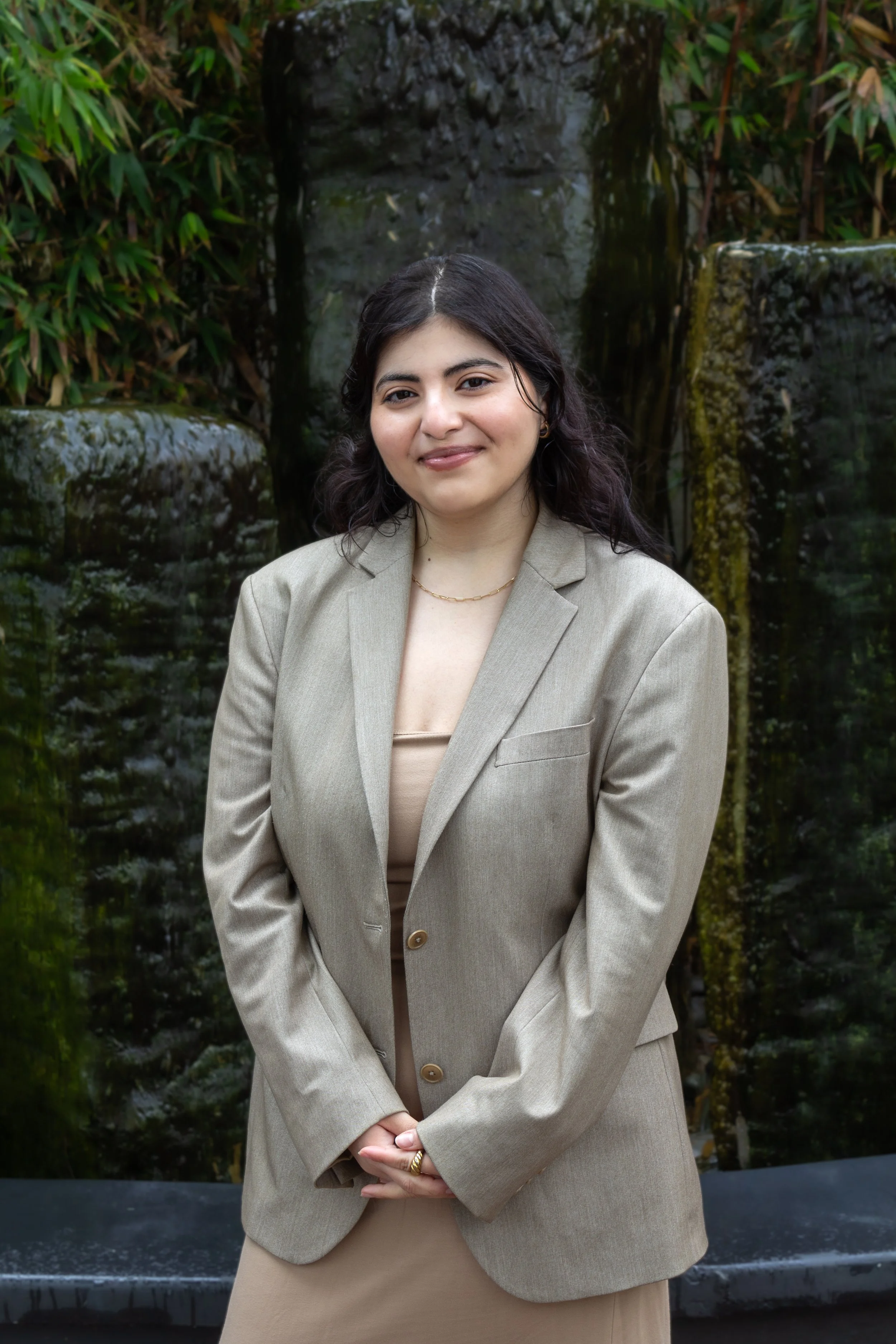 an image of Anahit Oksouzian smiling at the camera