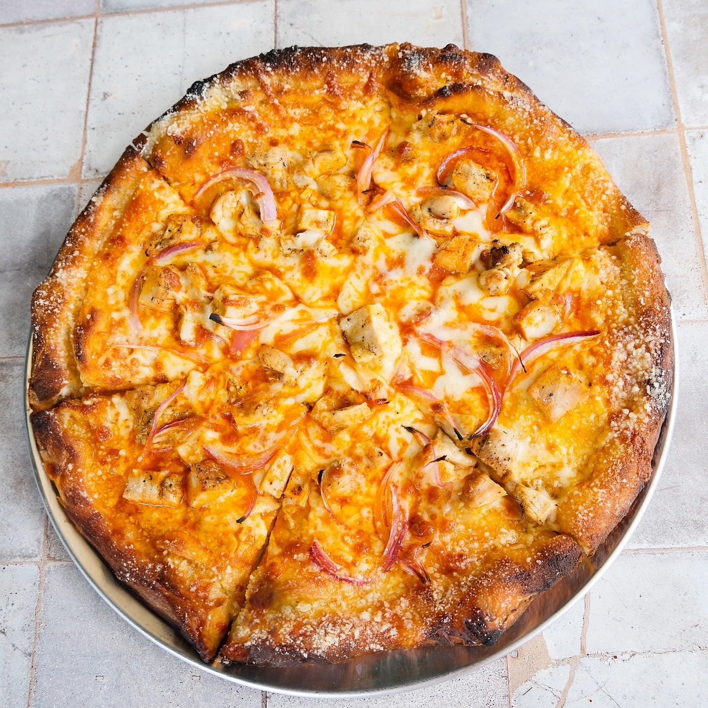 Buffalo chicken pizza &mdash; because plain cheese just isn&rsquo;t wild enough