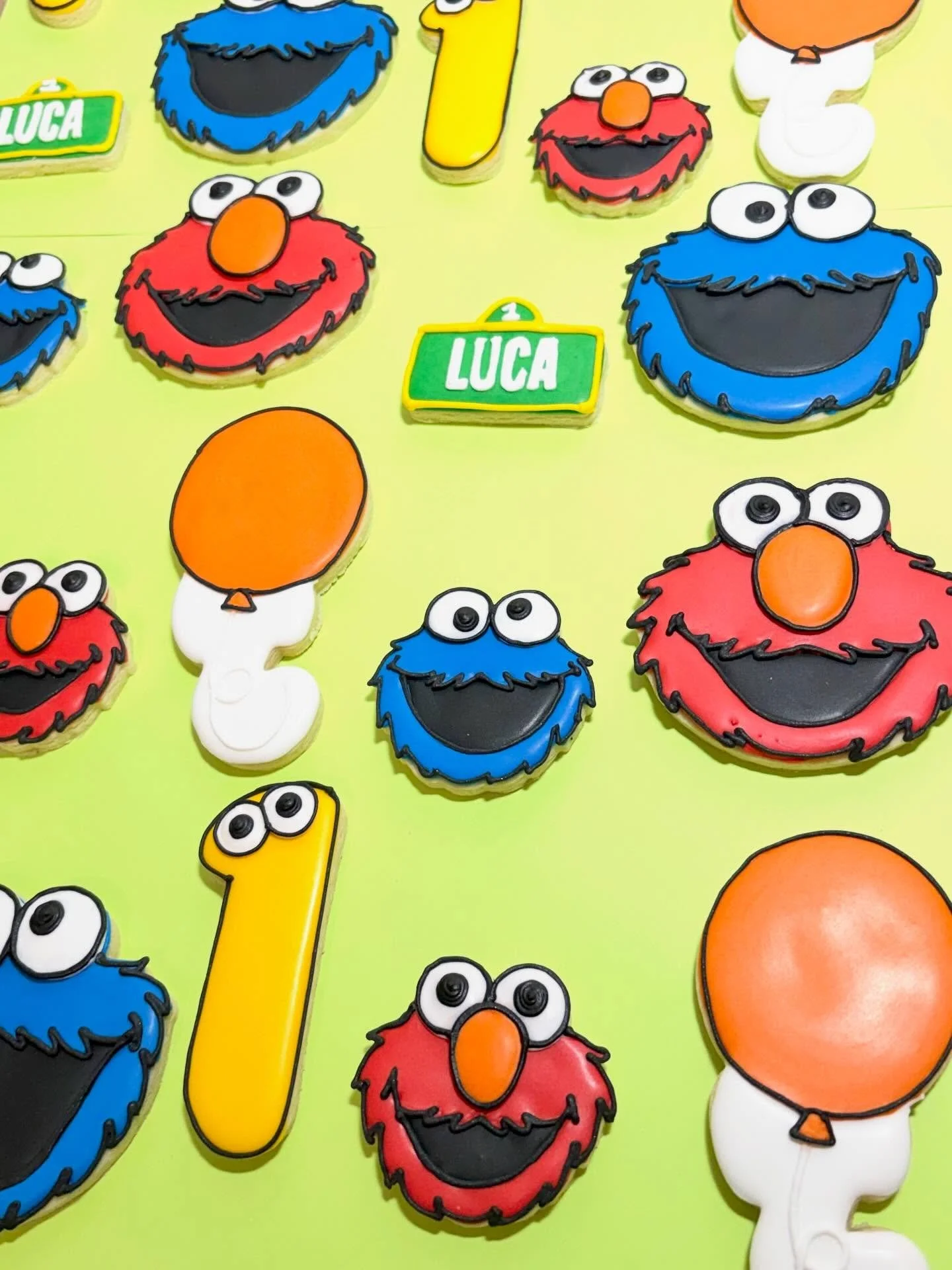 Happy 1st birthday cookie set featuring Cookie Monster and Elmo!