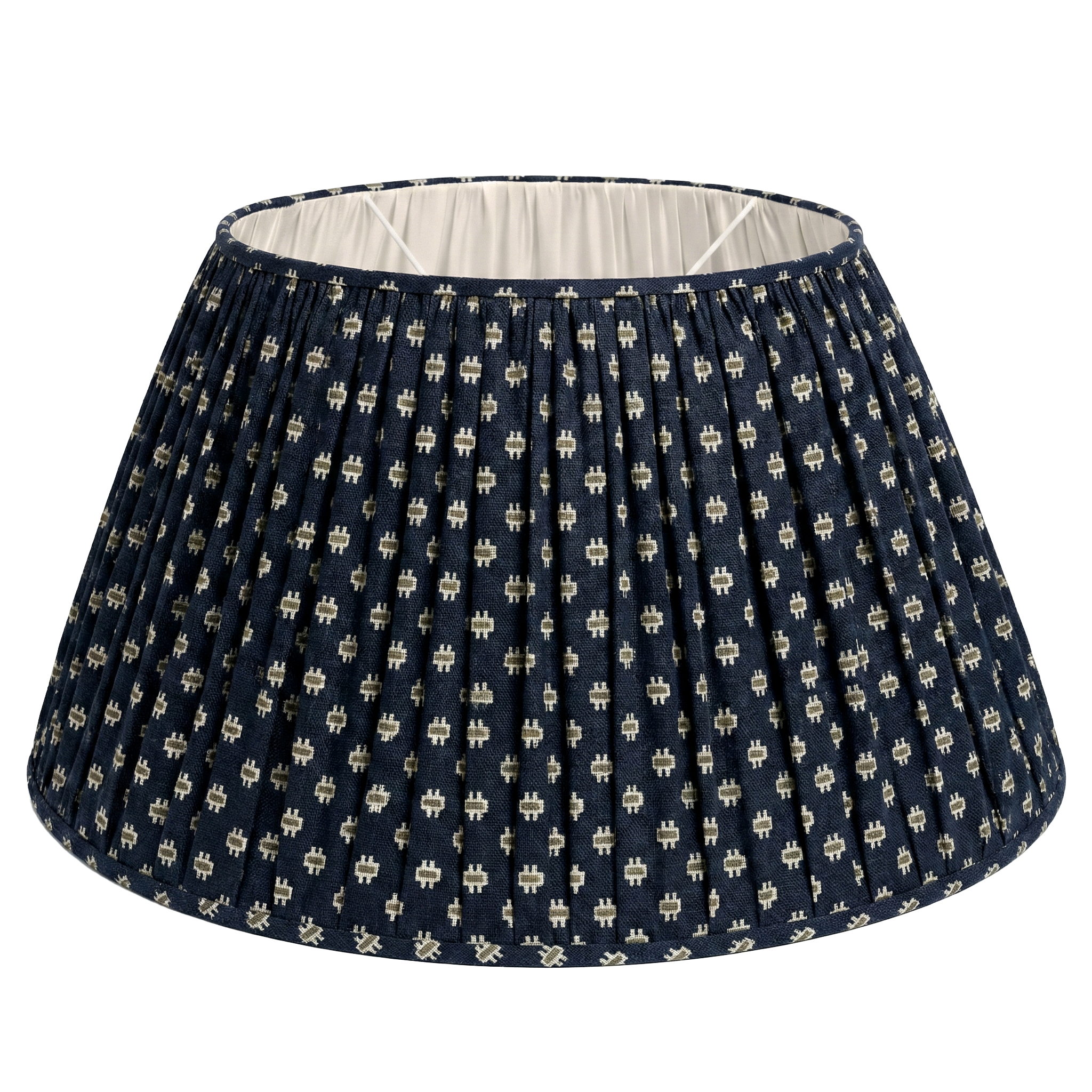 Catti Litke bespoke fabric lampshade in Scarab Navy; a small-scale geometric pattern based on a 19th-century Massachusetts postage stamp quilt, hand-printed on 100% natural linen.