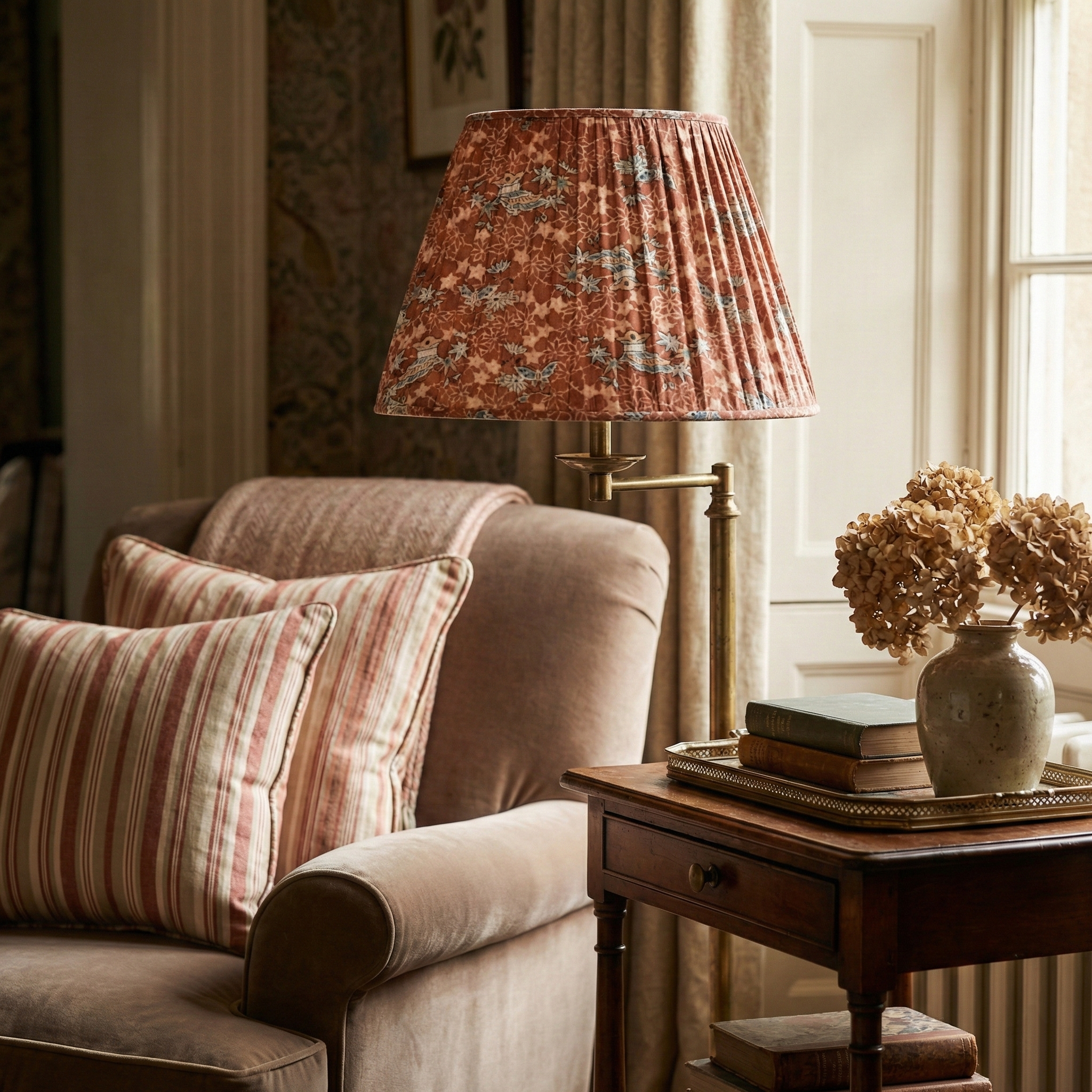 Bespoke Akasarasa Rust fabric lampshade styled on an antique lamp base in a curated residential living room, highlighting the archival Japanese bird motif.