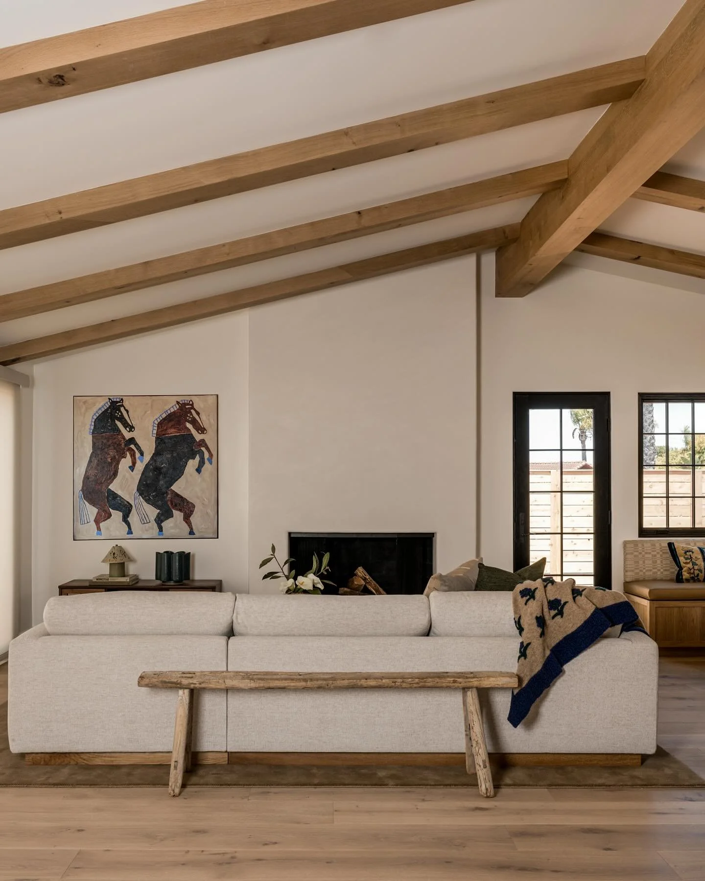 Continuing along in showcasing our Canyon project, you&rsquo;ll find the living room just off the kitchen and breakfast nook area. We kept the palette neutral to balance the colors of both the nook and the kitchen. The footprint itself is on the smal
