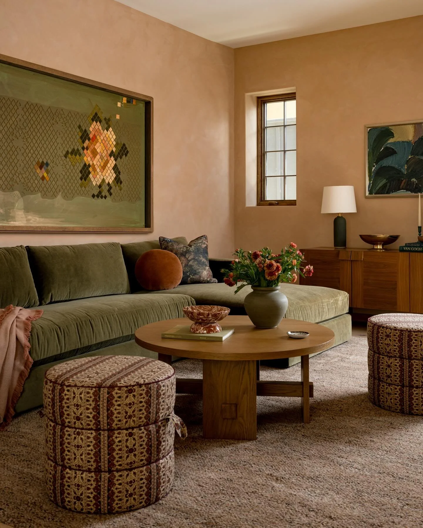 Color-drenched&hellip;.

The den at our Canyon project is well equipped for midday naps and movie marathons. While the main body of this home is clad in a warm white hue, we chose to soak the walls of this space in a custom terracotta plaster, huggin