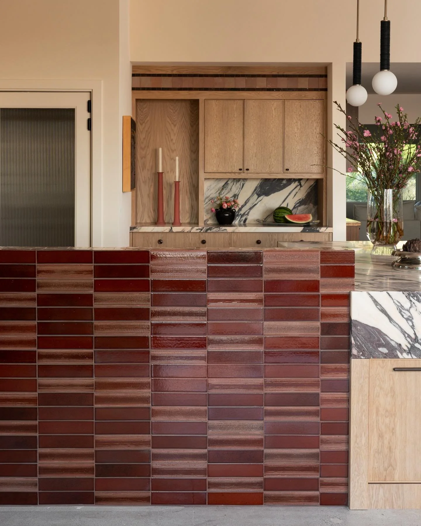 Material mix&hellip; an intersection of Japanese glazed tiles and viola marble meet. In the background, you&rsquo;ll see the storage I shared last week with the tiled soffit you all loved so much.

The red Japanese glazed tiles from @zia_tile match t