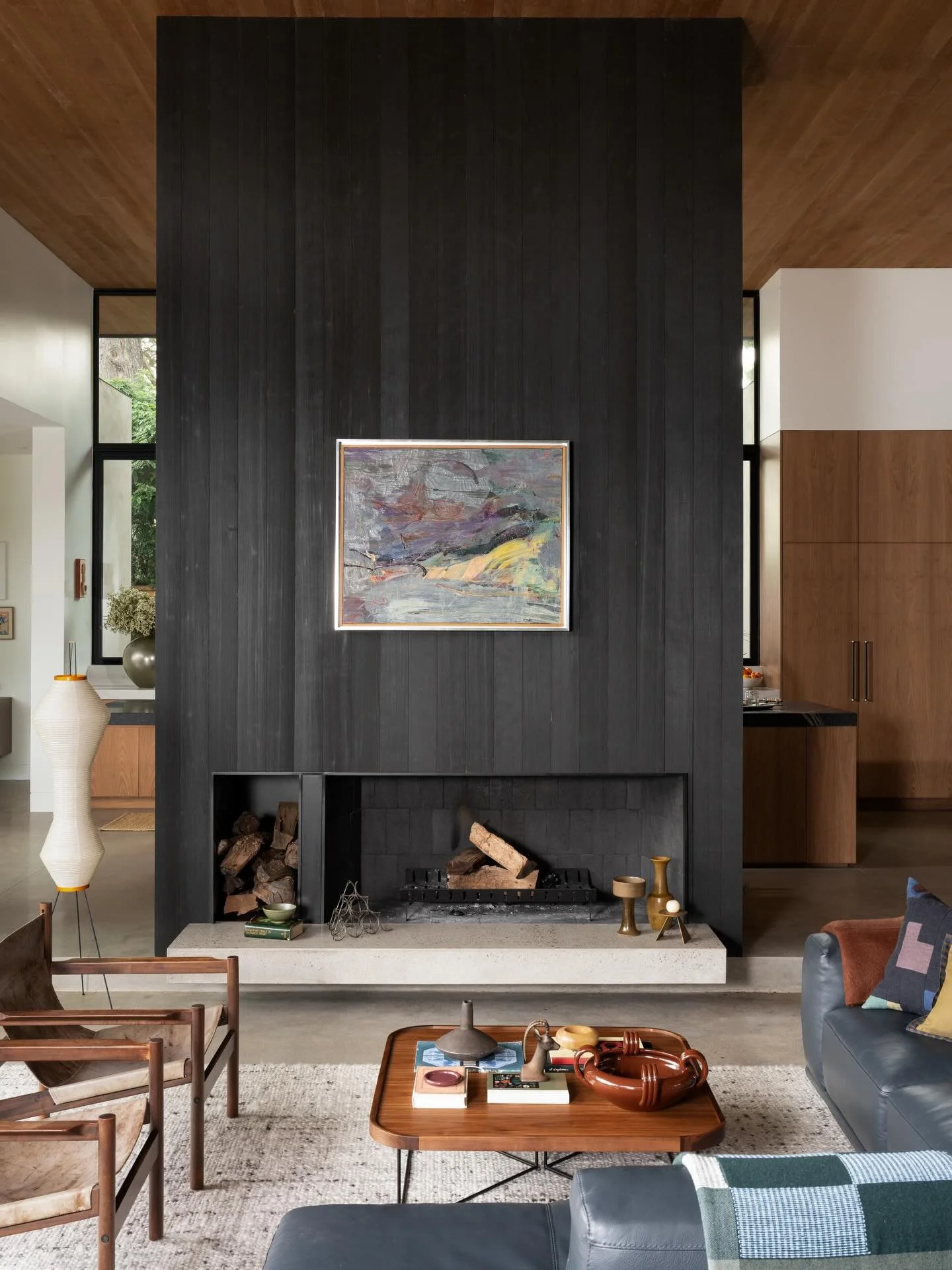 Charred wood clads the fireplace and grounds the sunken living room in our Wilstone project with @fieldxstudio.

Architecture/Build: @fieldxstudio 
Interiors/Styling: @anaberdesign 
📷: @charlotteleaphotography 

#anaberdesign #sunkenlivingroom #fire