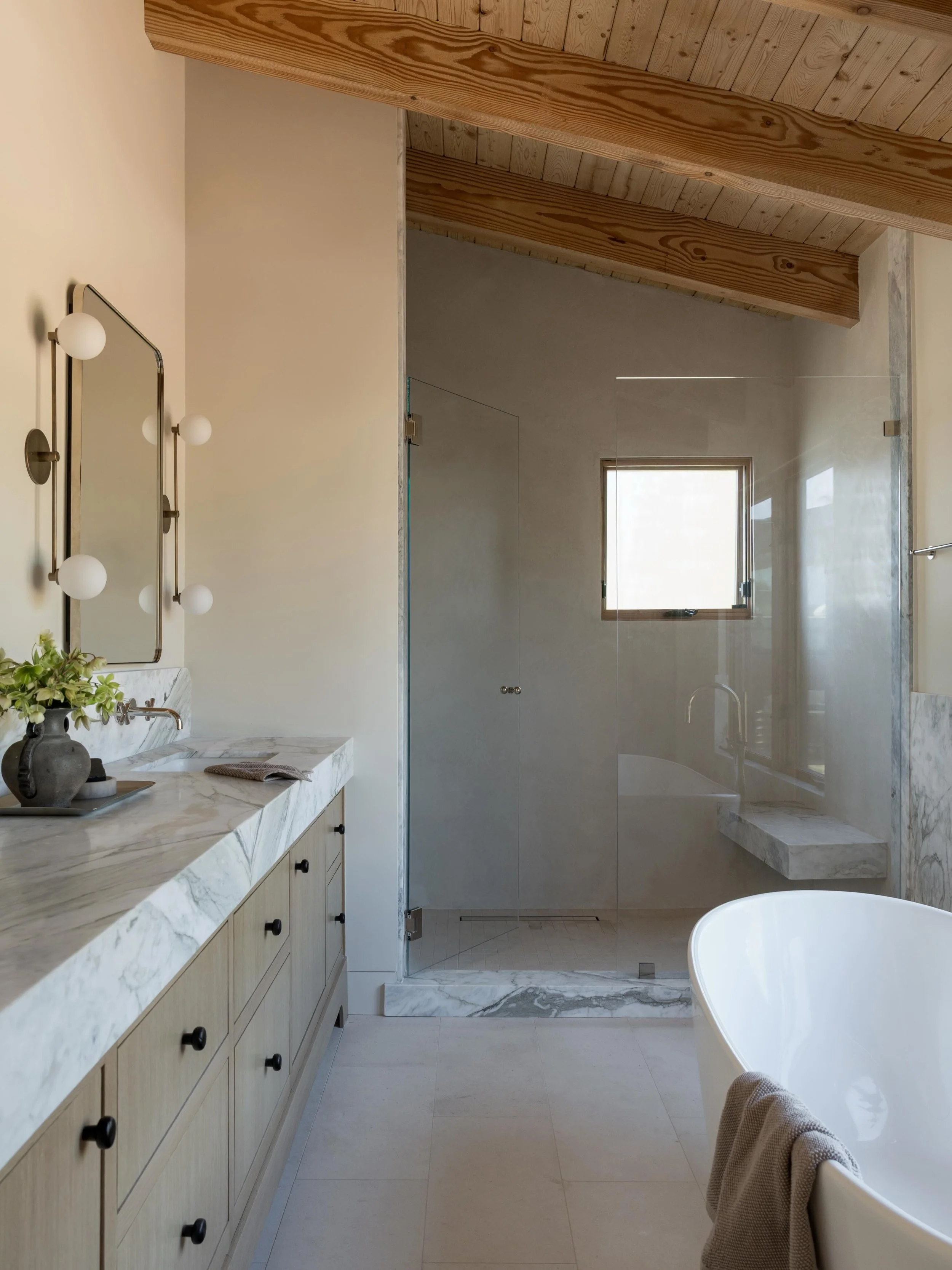 A space that breathes&hellip;. Plaster, wood, marble, and limestone comprise the material palette for our main bathroom at #aNDsunset.

Design/Styling: @anaberdesign 
Build: @oregontrailremodel 
📷: @charlotteleaphotography