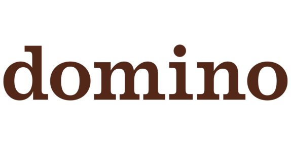 Close-up of the word 'domino' in brown lowercase letters.