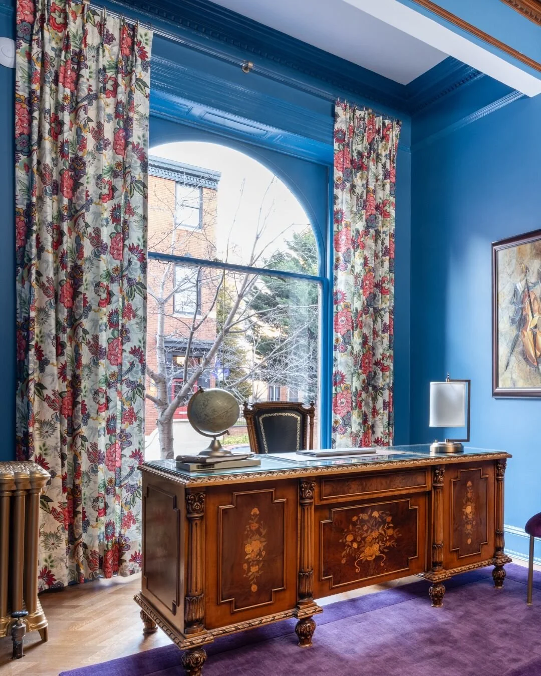 Sophistication meets inspiration: vibrant colors, luxurious textures, and a rich, stunning antique desk make this workspace unforgettable. #KDDesigns #CustomInteriors #CustomFabrics #InteriorDesign #InteriorDesigner #OfficeDesign #LivableLuxury