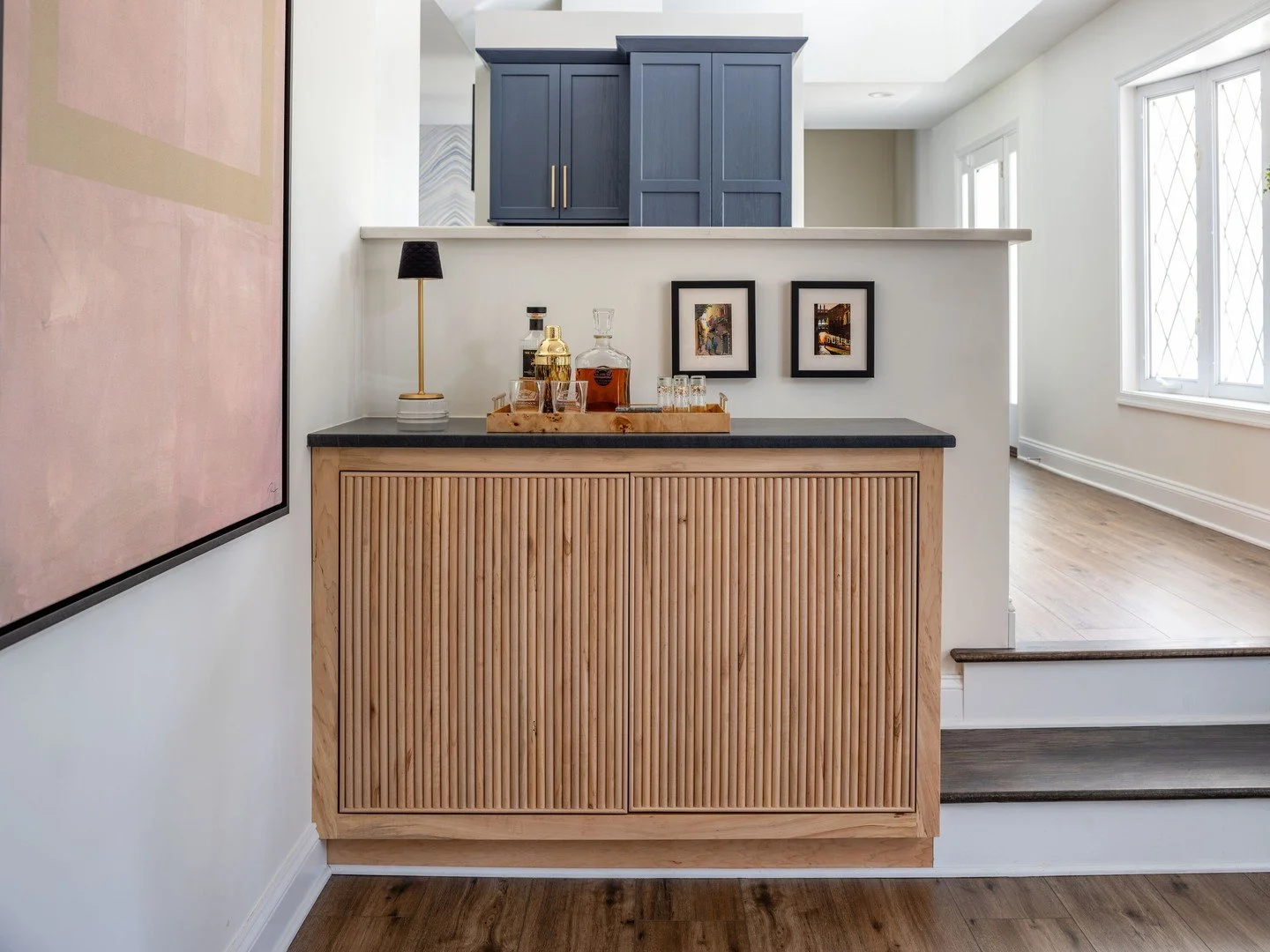 Custom millwork is always a great idea! This custom built-in bar cabinet is designed for both beauty and function&mdash;perfectly tailored for effortless entertaining. #KDDesigns #CustomInteriors #CustomCabinetry