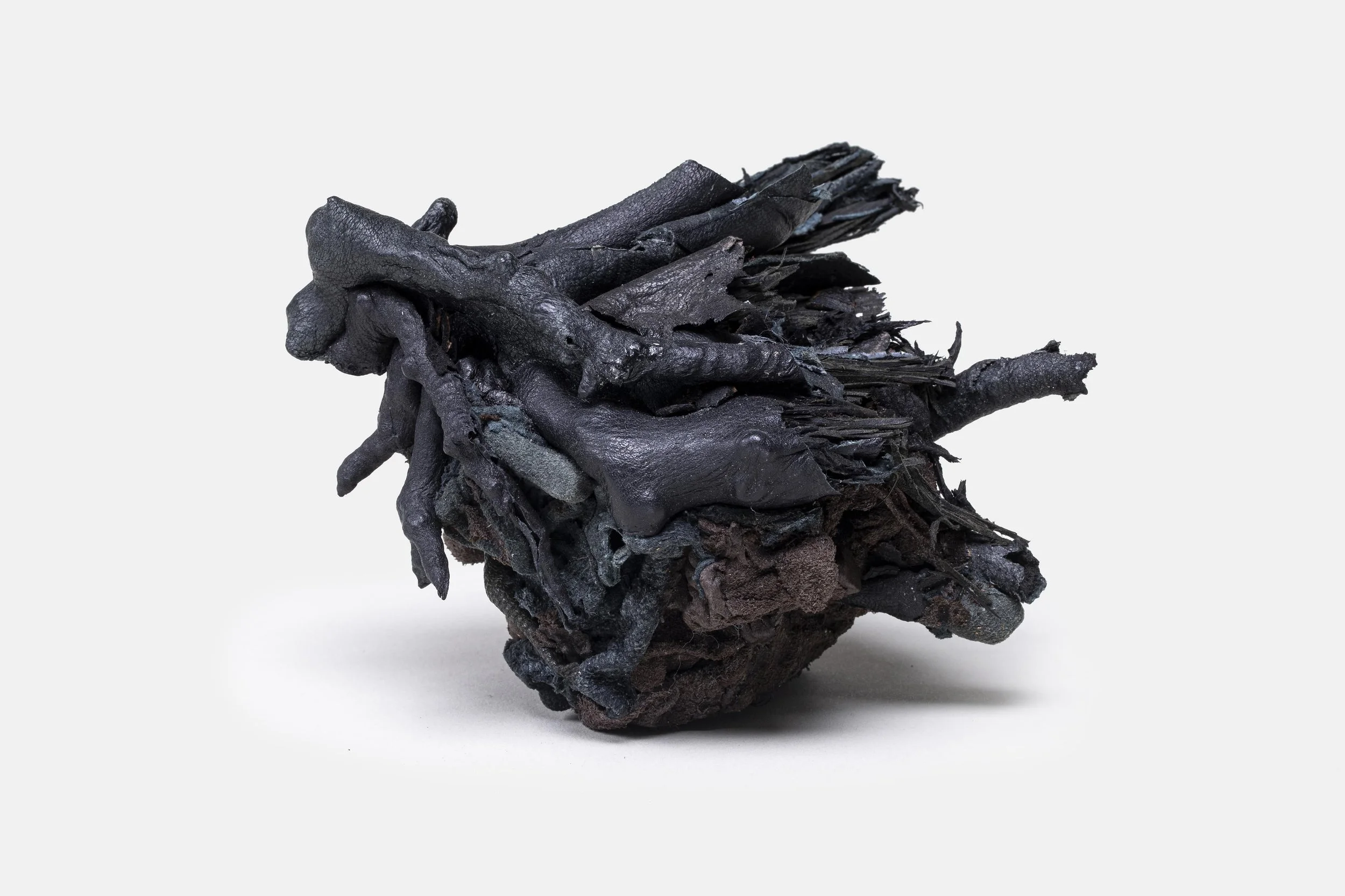 A rhizome uprooted from a scorched land, 2021, recycled leather, 13.2x9.9x9.7 cm